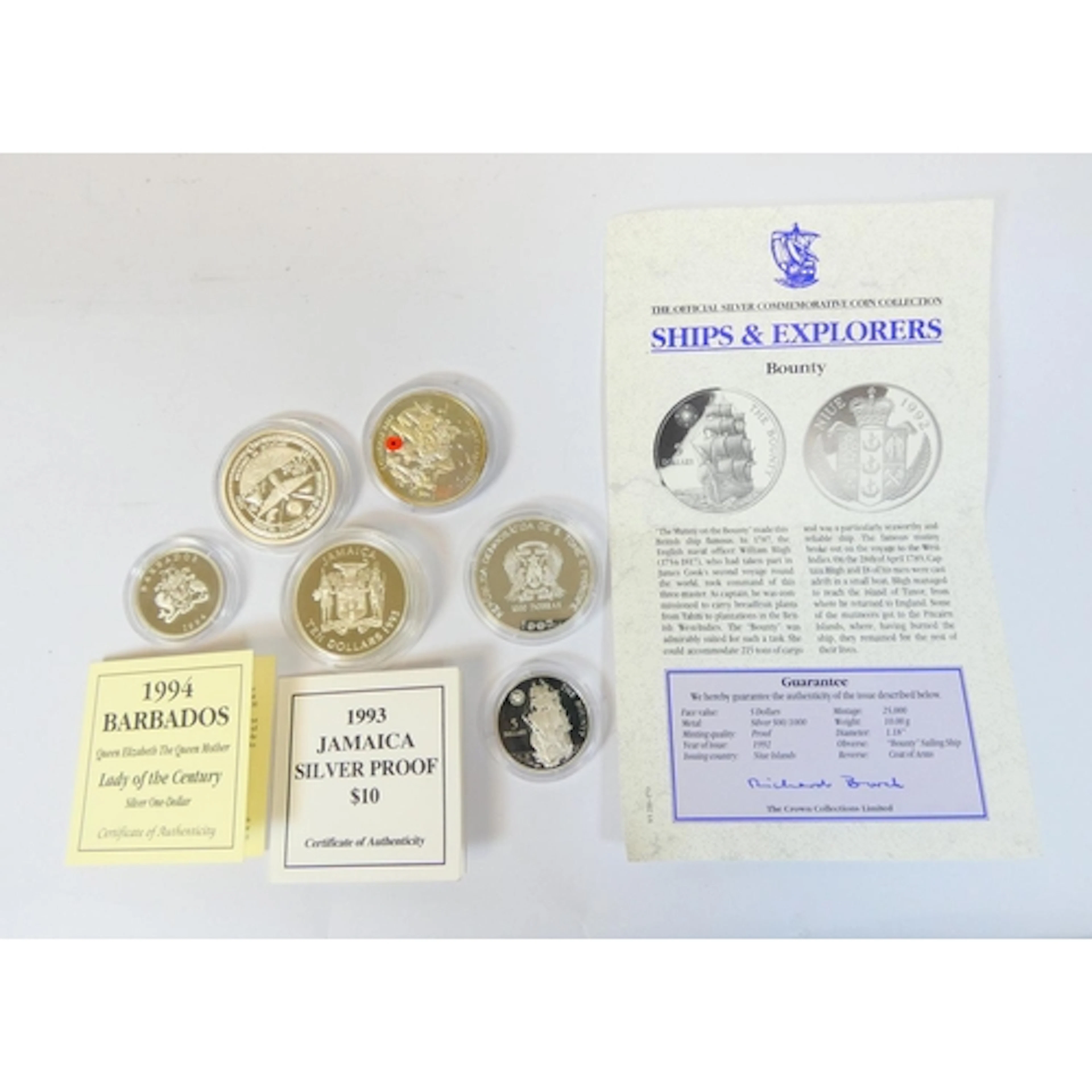Group of commonwealth and world silver coins to include a 20...