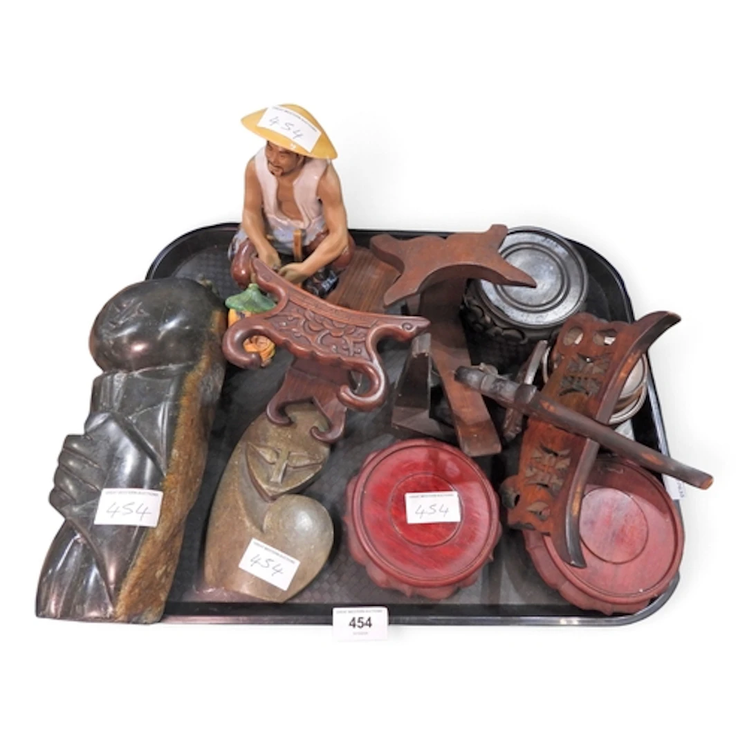 Two Zimbabwe shona stone carvings 15 and 25cm high,three cer...