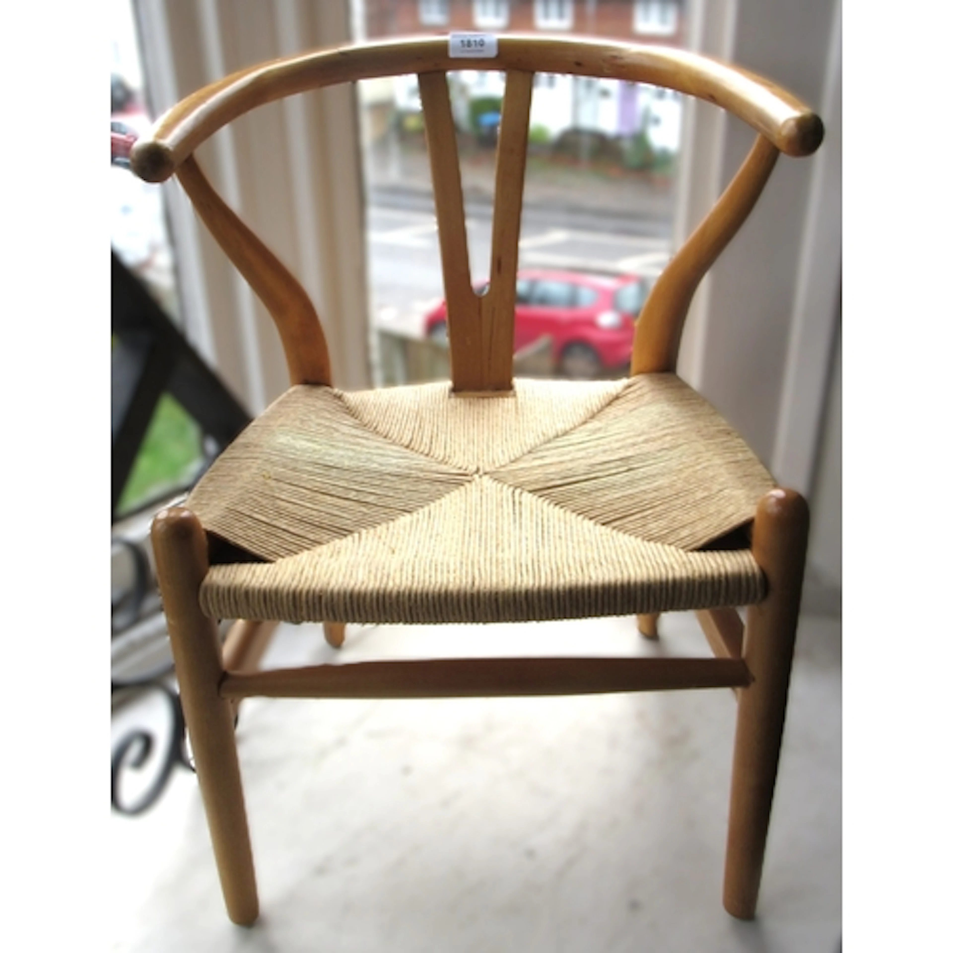 After Carl Hansen, children's beechwood and rush seated wish...