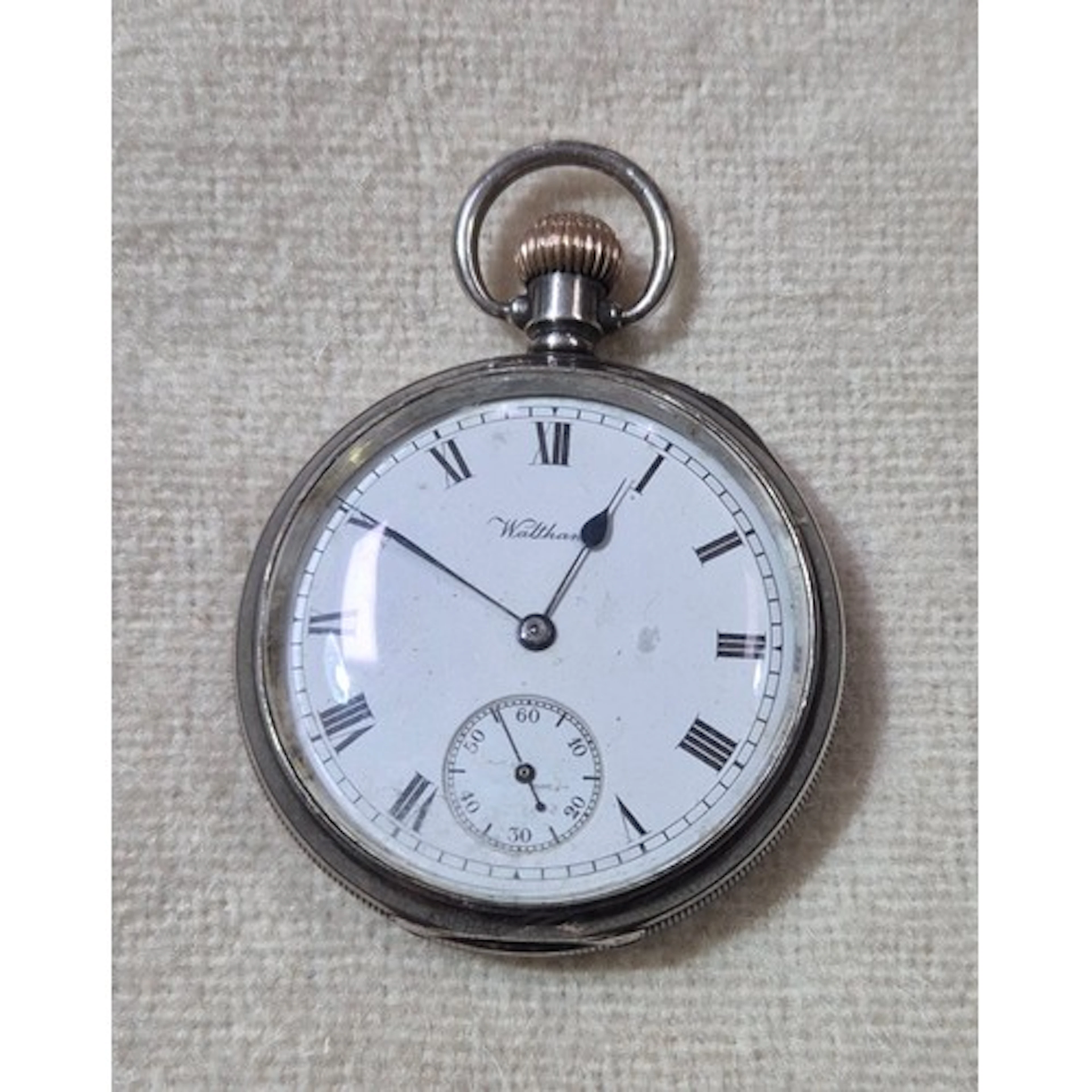 A WWI era silver pocket watch with presentation inscription ...