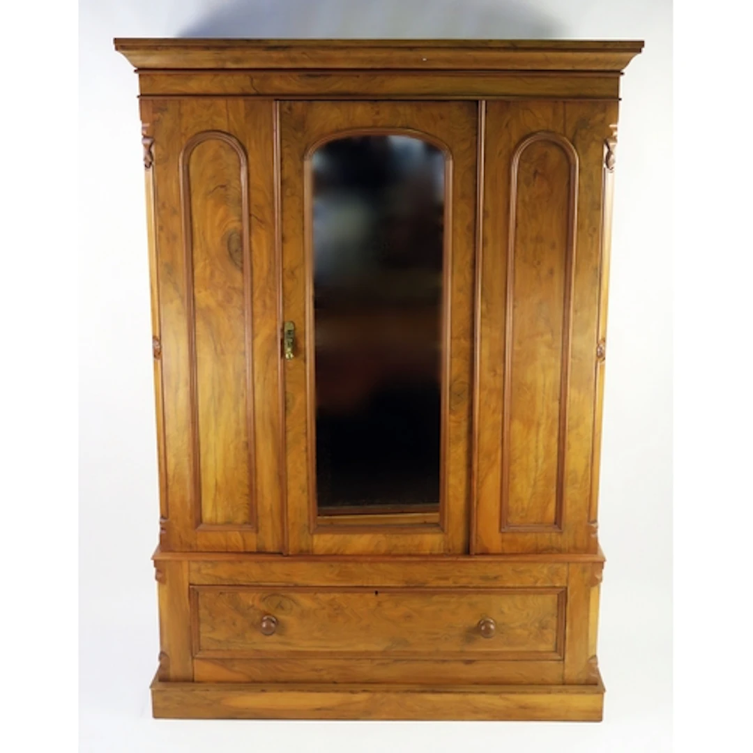 A late Victorian satin walnut wardrobe, of rectangular outli...