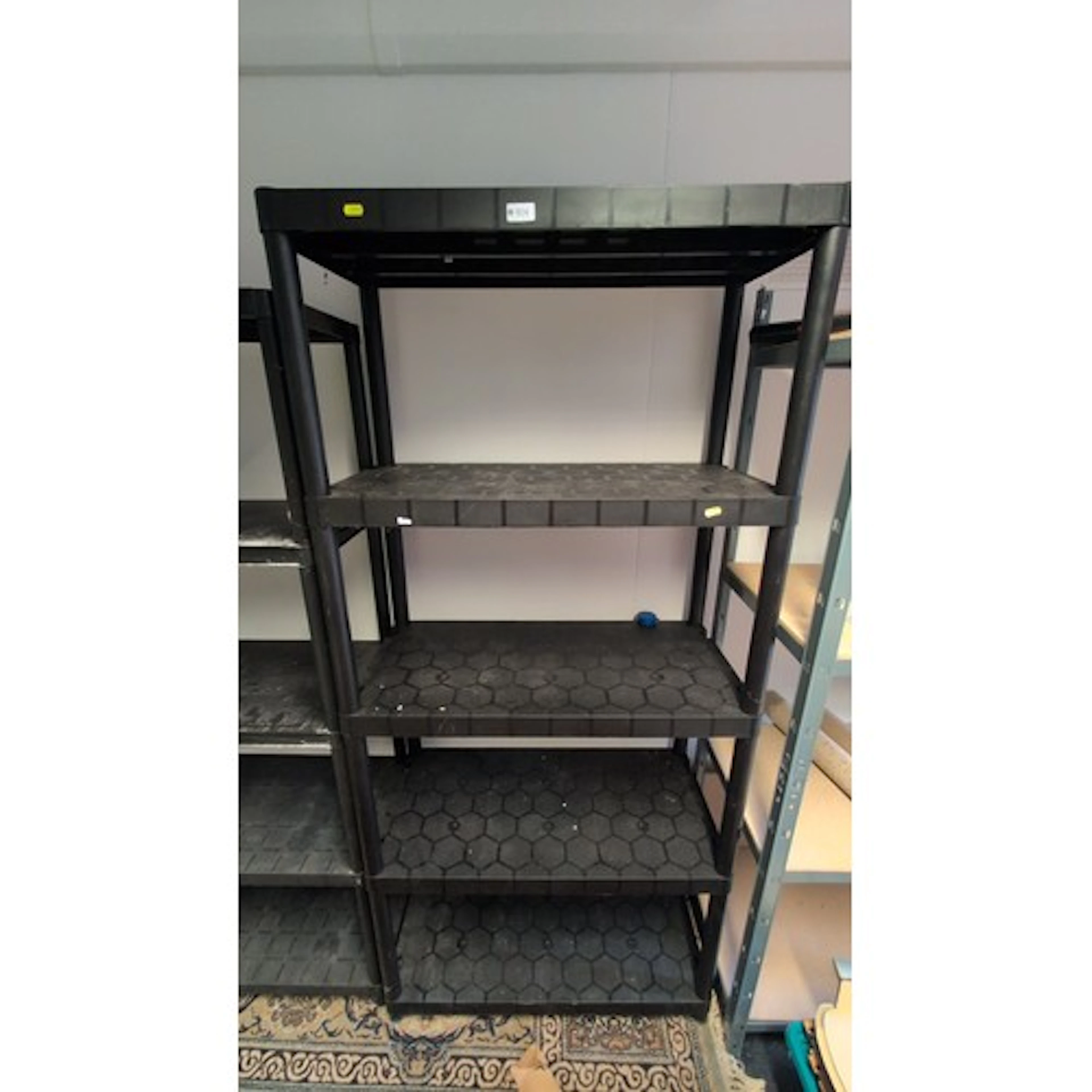 1 x Modular plastic shelving system in black, comprising int...