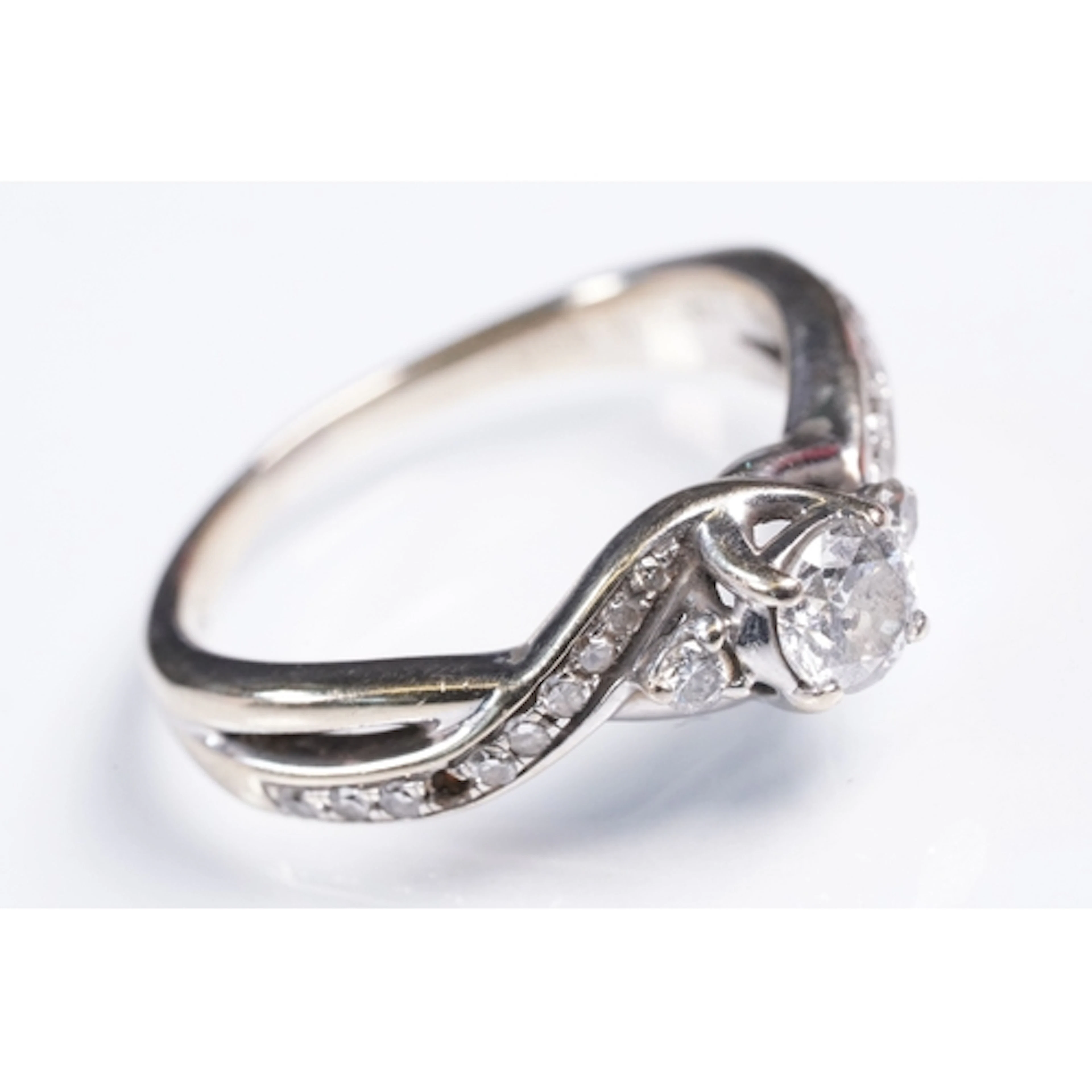 18ct white gold and diamond ring. The ring being set with a ...