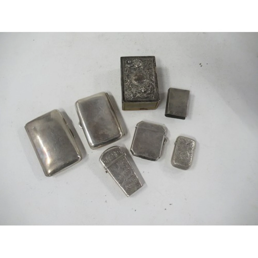 A collection of silver, to include cigarette cases, vesta ca...