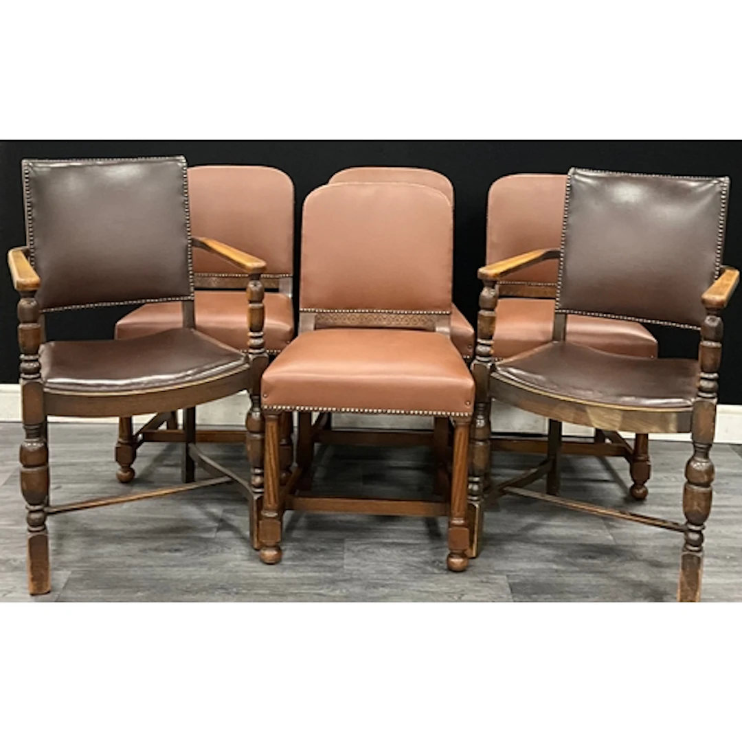 A set of four 20th century dining chairs with two associated...