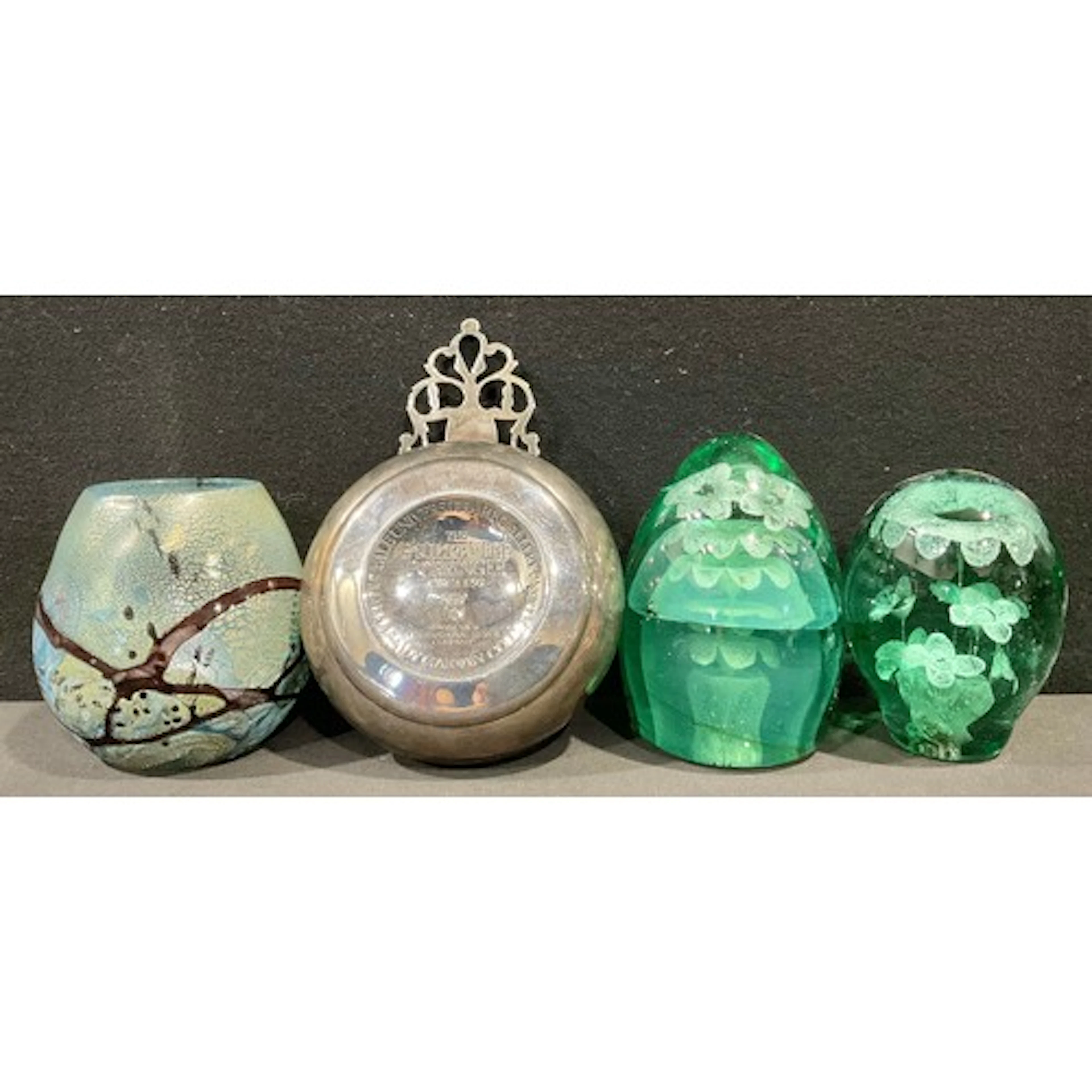 A 19th century green glass dump, flower incusion, c. 1880; a...