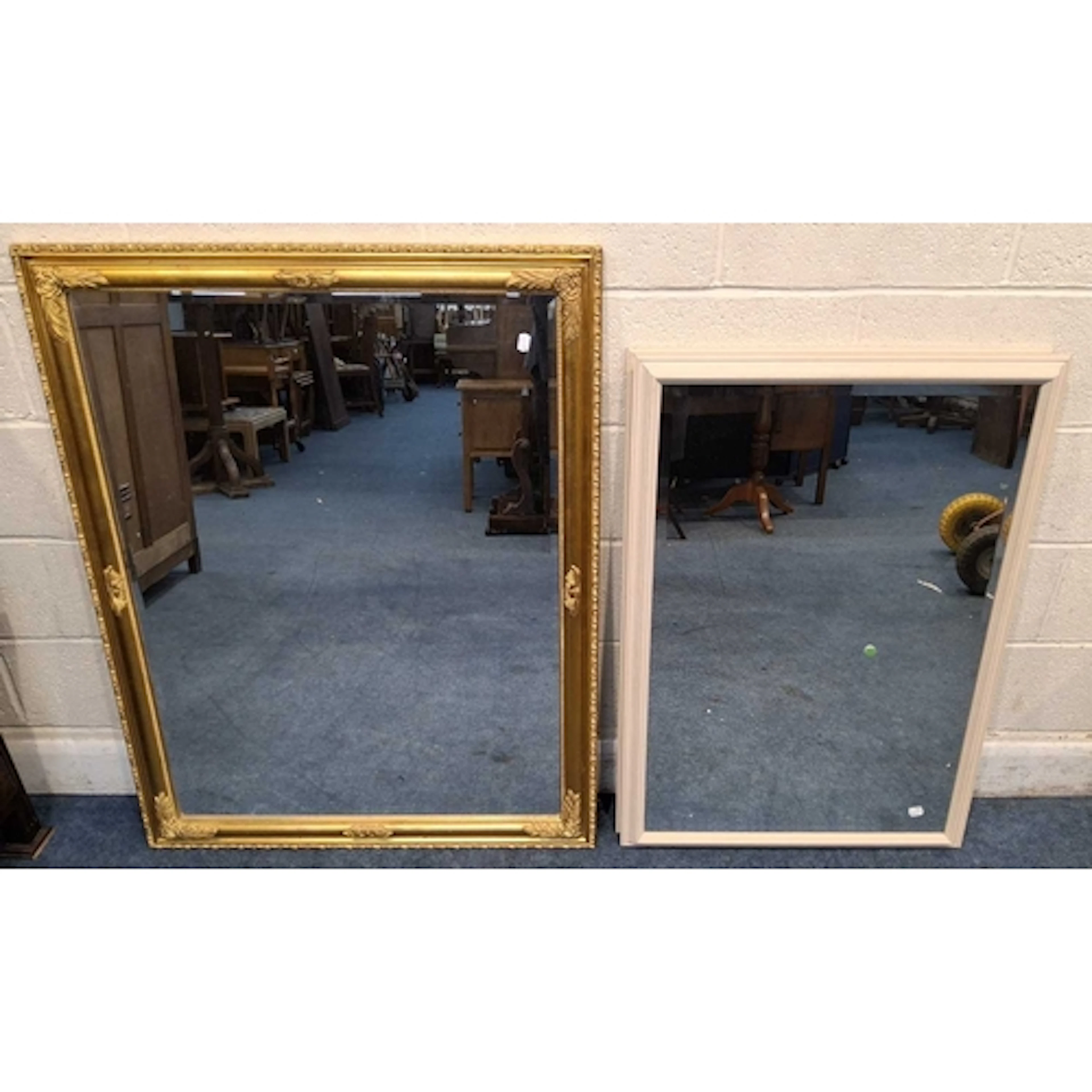 A GILT WOOD BEVELLED EDGE RECTANGULAR WALL MIRROR, along wit...