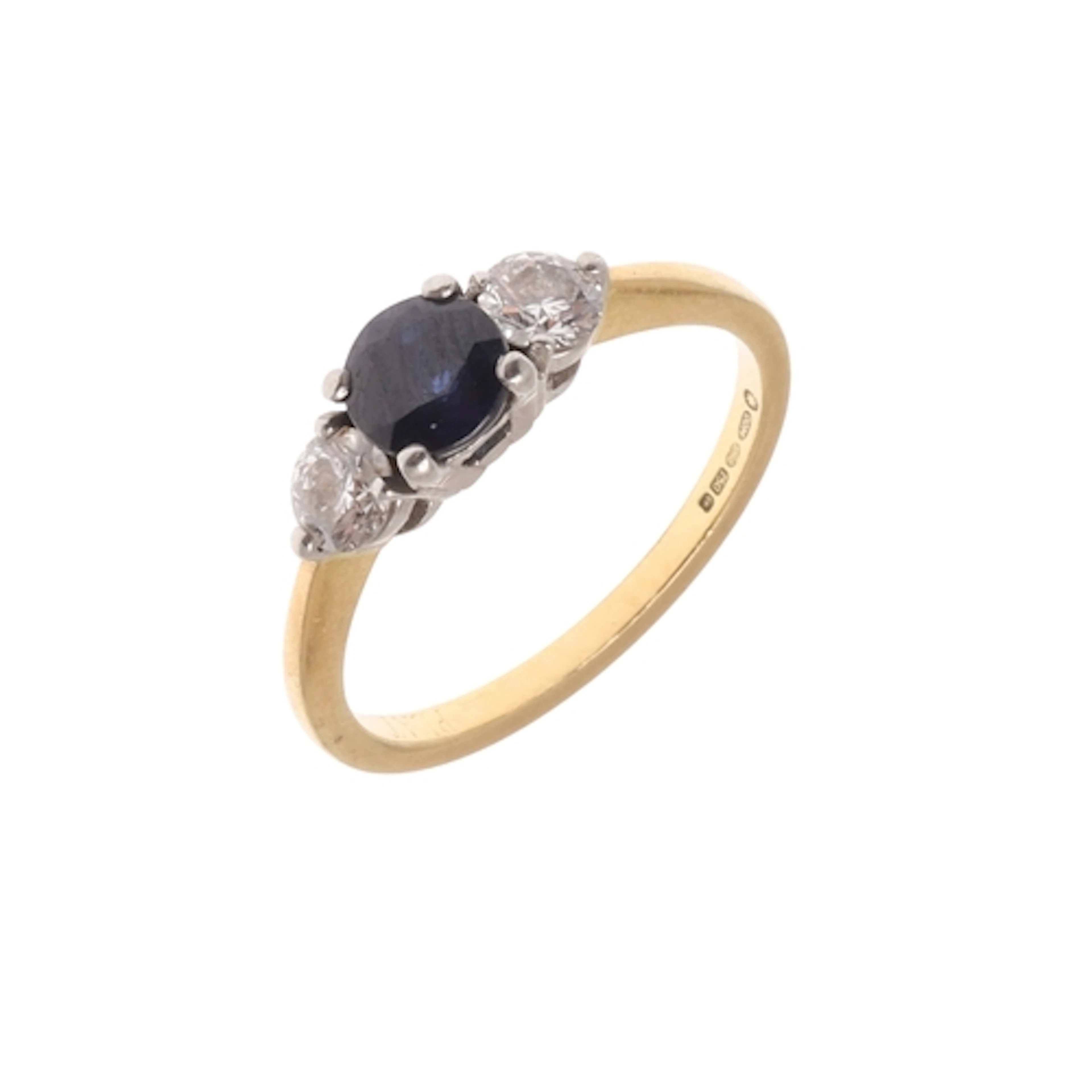 A SAPPHIRE AND DIAMOND THREE STONE RING. the circular-cut sa...