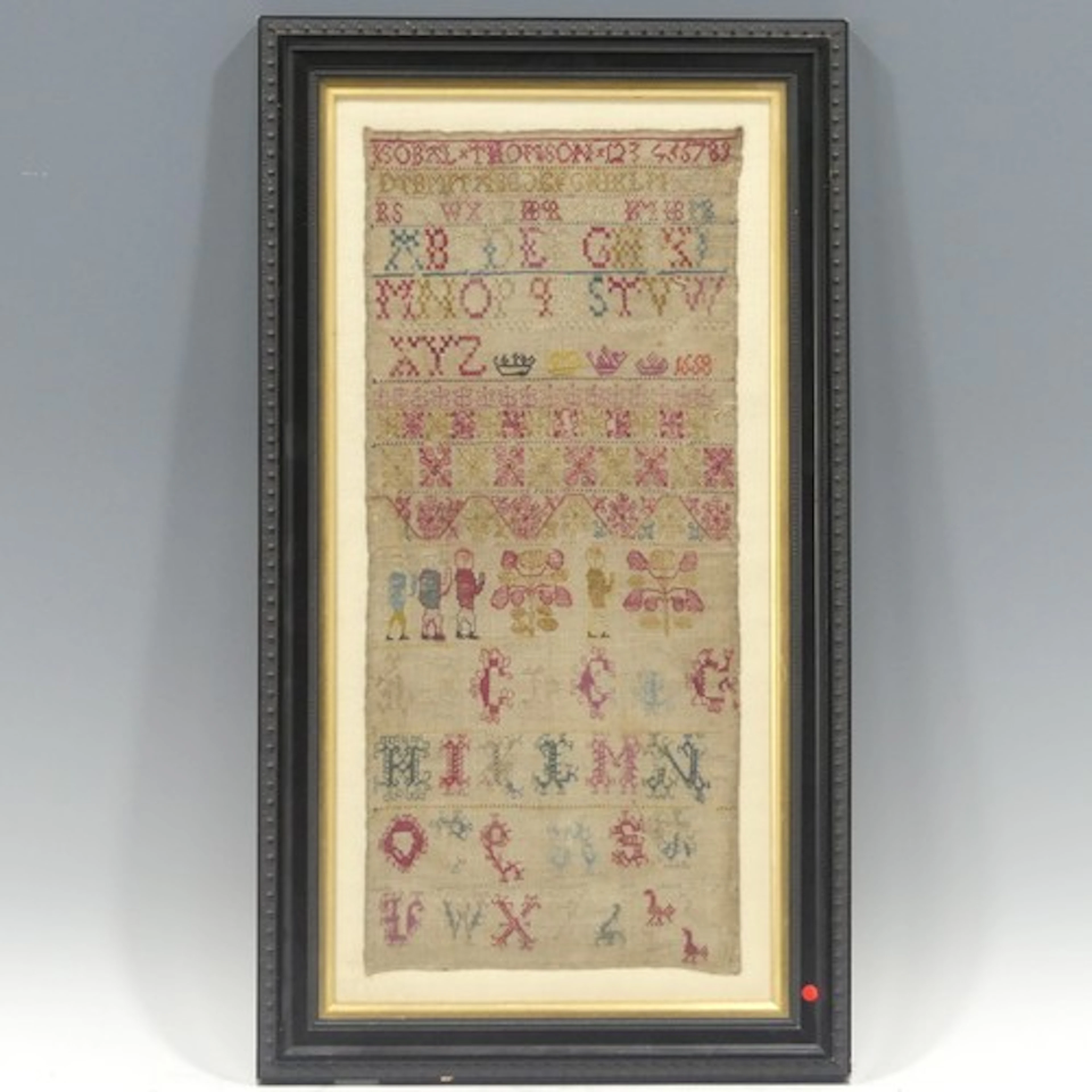 An late 17th century needlework alphabet and number Sampler,...
