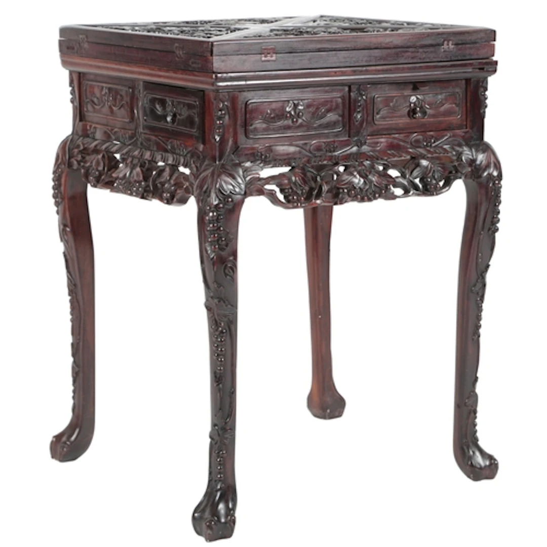 A Chinese carved hongmu envelope card table, c.1900, the fol...