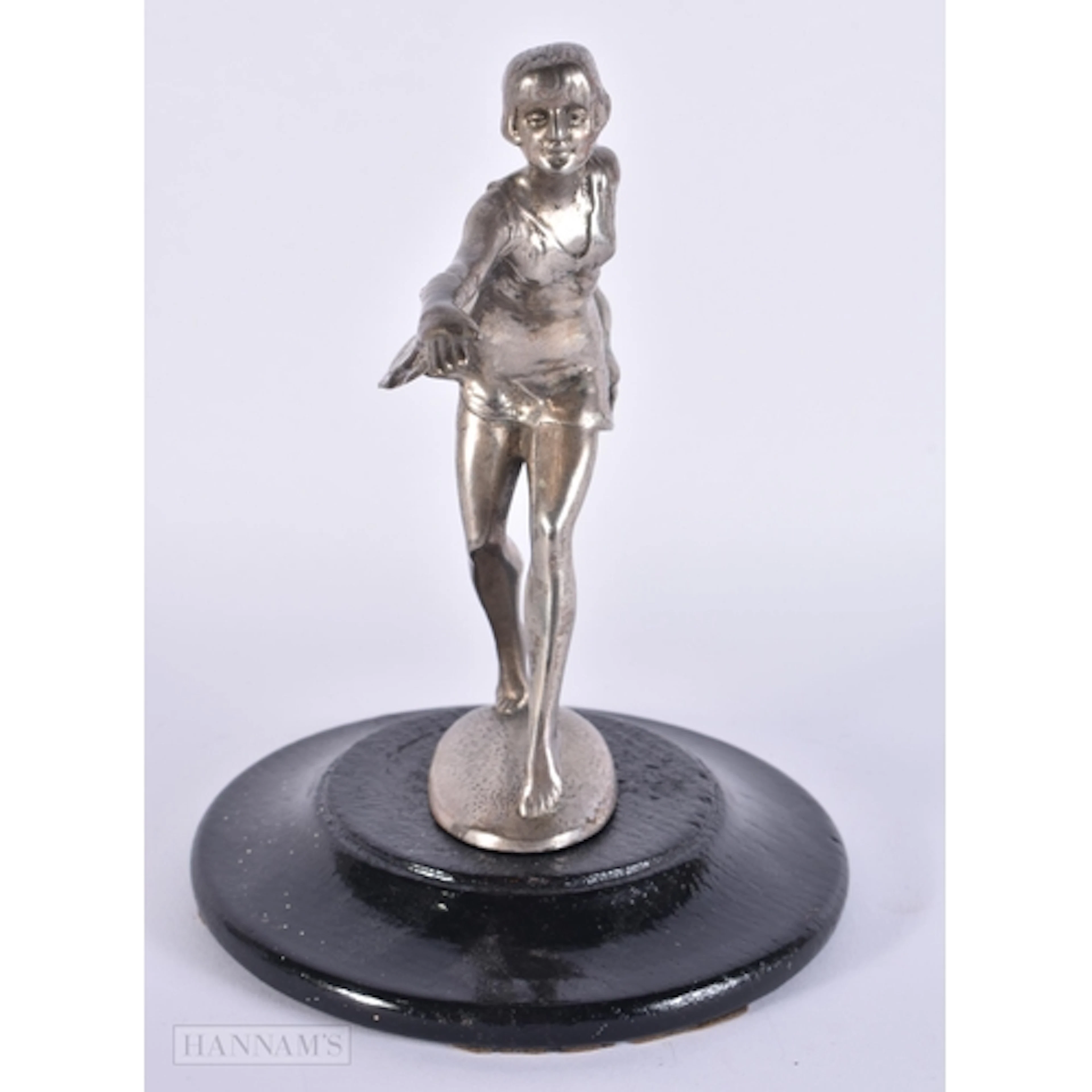 A 1920S DUTCH DANCING GIRL CAR MASCOT by J Aland. 19.5 cm hi...