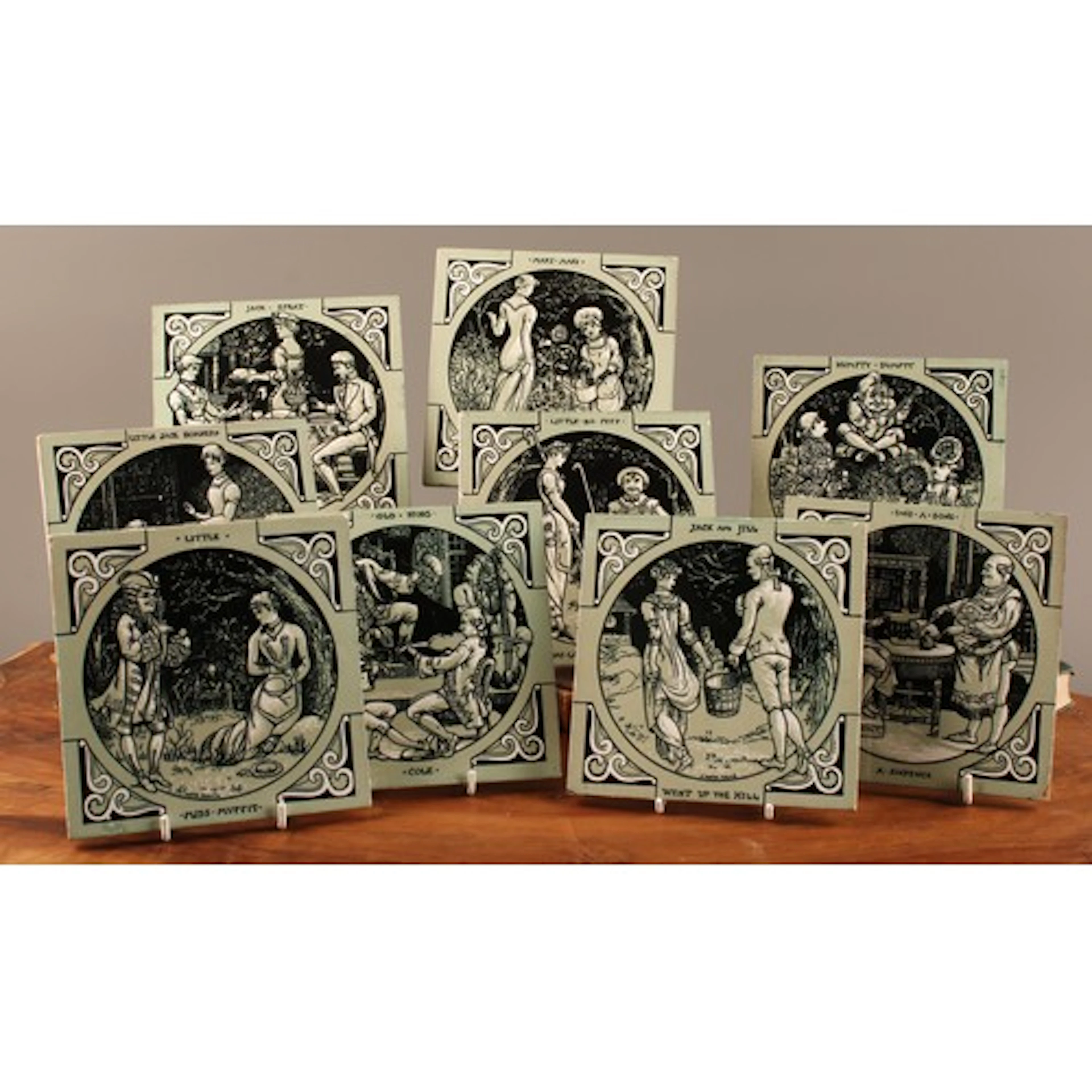 A set of nine 19th century Minton, Hollins & Co. tiles, desi...
