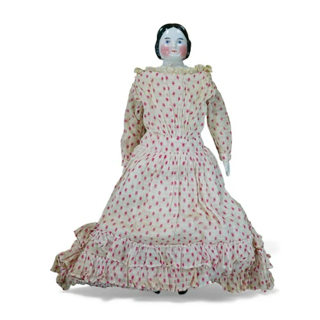 A 19th century German porcelain shoulder-head pink tinted do...