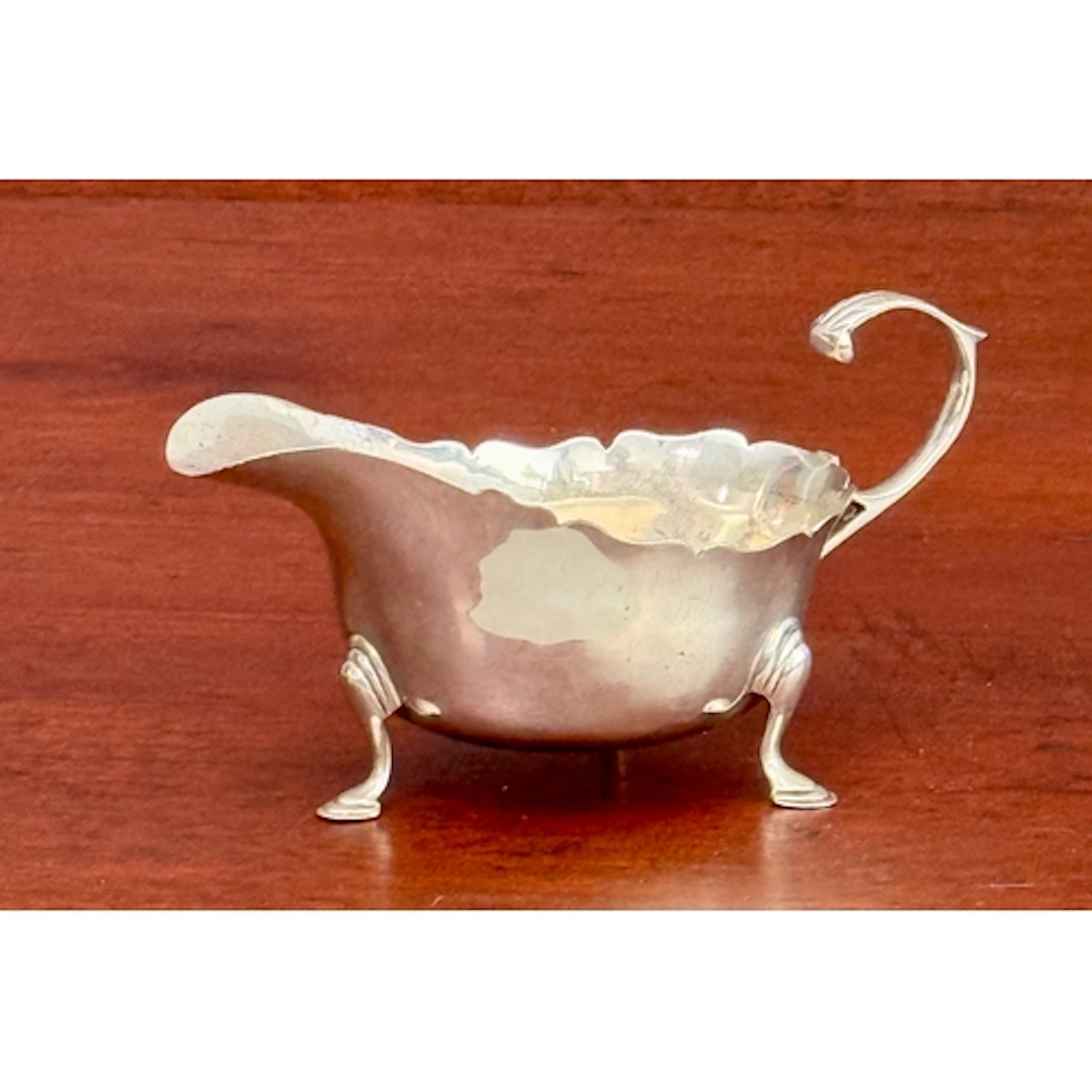 A late-Victorian silver sauce boat - Thomas Hayes, Birmingha...