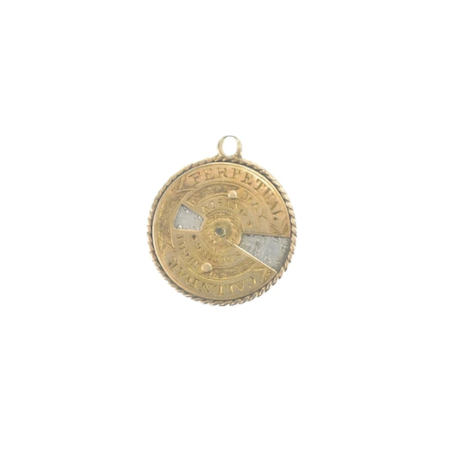 A Victorian gold and silver perpetual calendar pendant/ fob,...