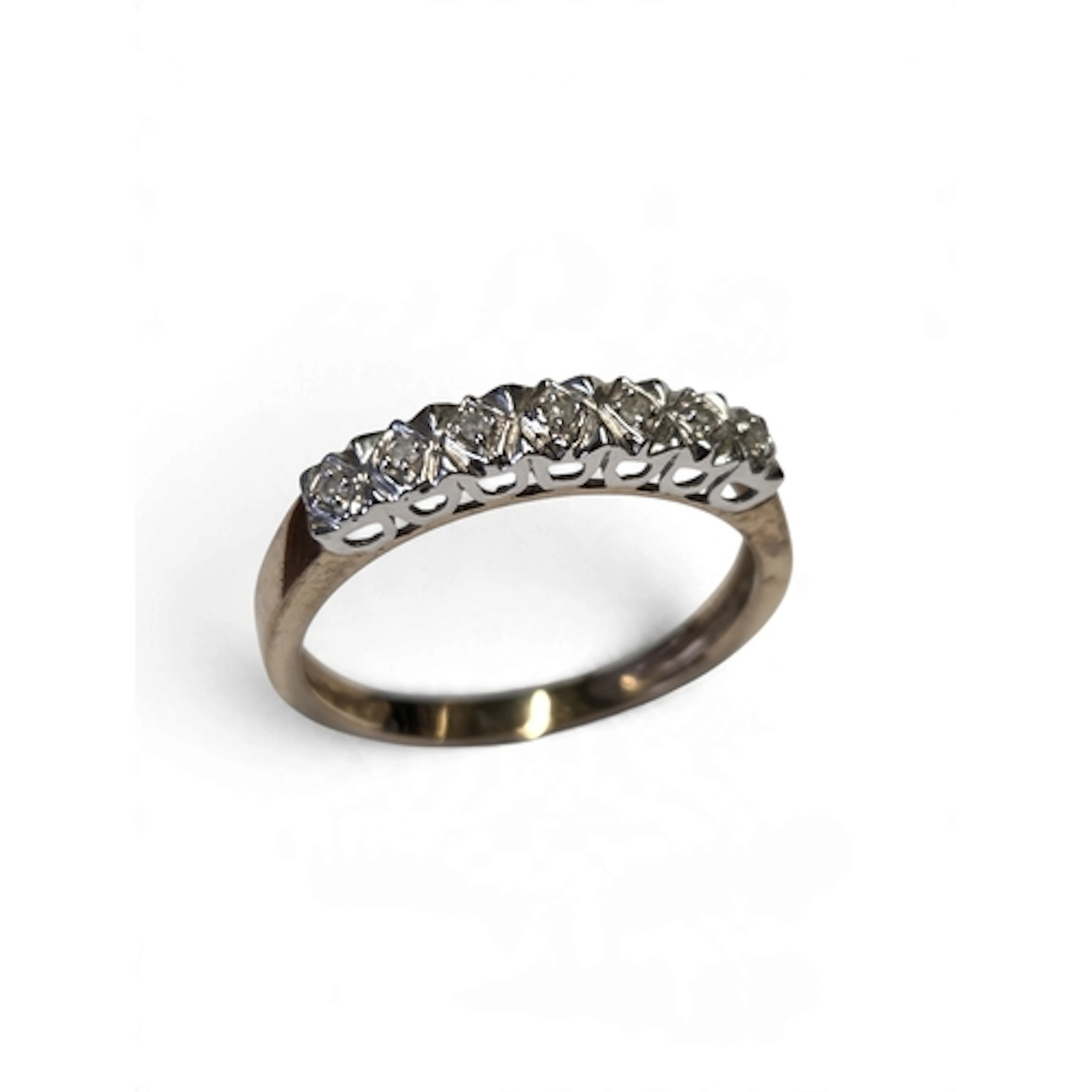A good 9-carat gold seven-stone illusion-set diamond half et...