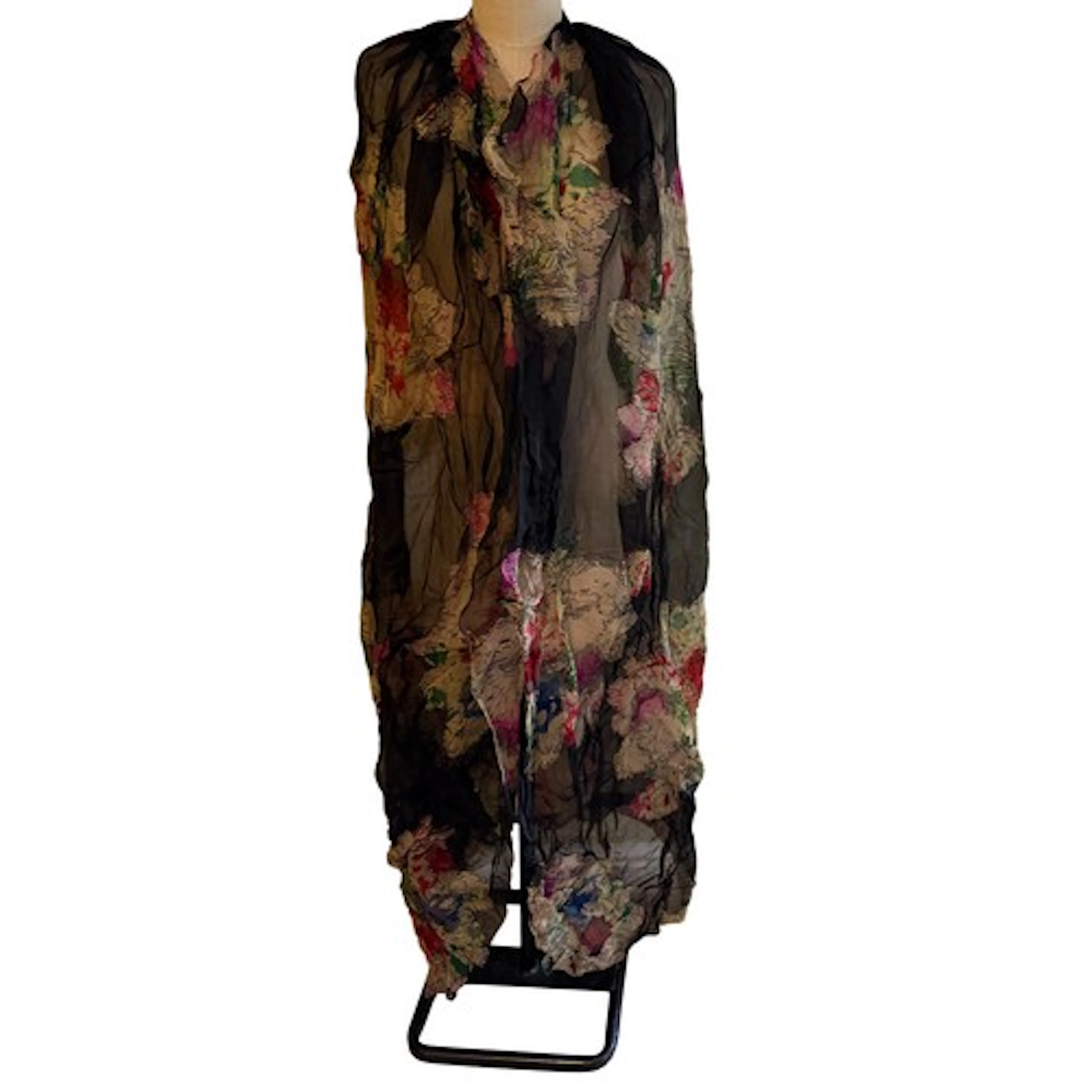 A printed floral silk organza cape. Back of neck to hem 125c...