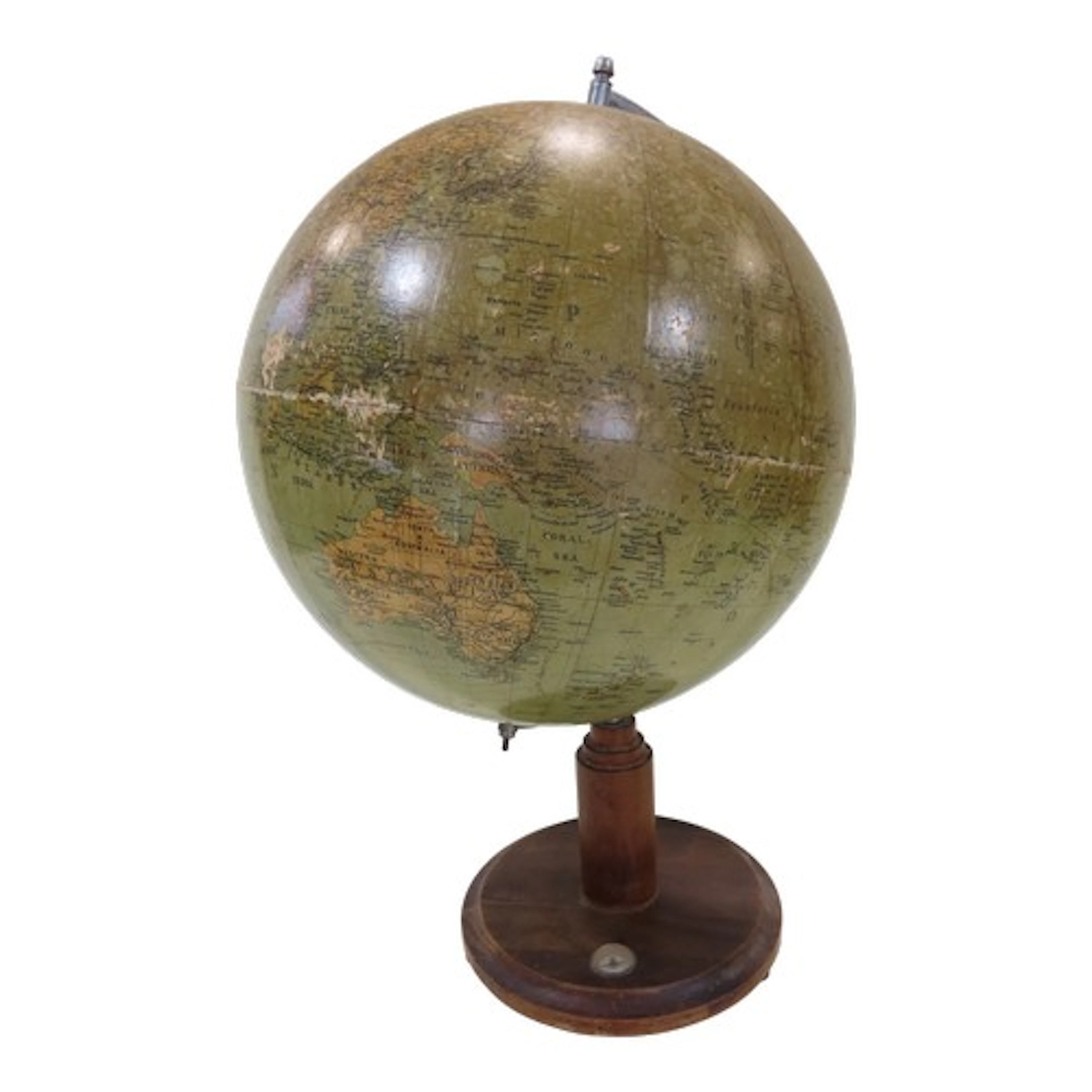 A vintage desk globe on wooden base with inset compass