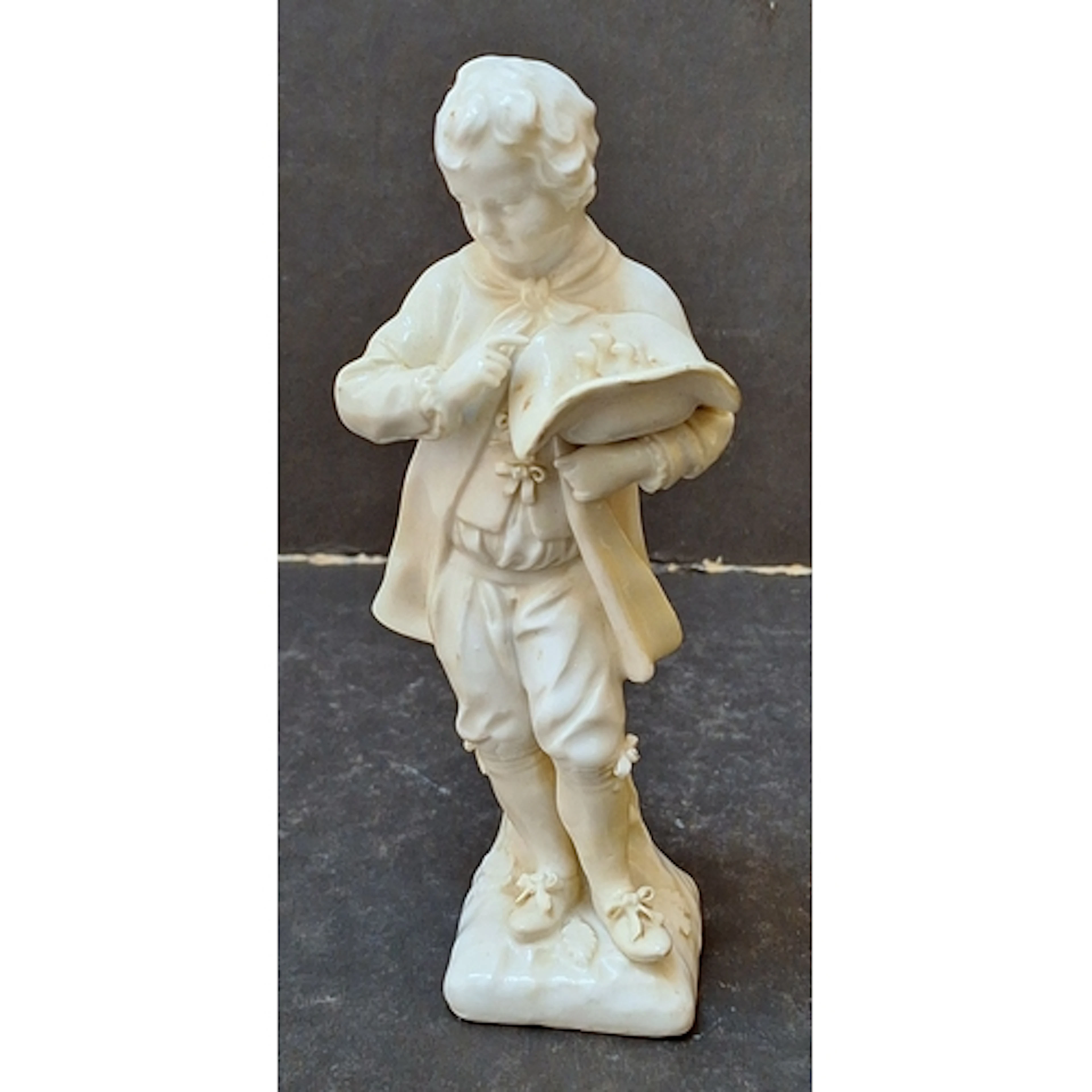Continental Parian Ware Figurine, young boy pointing at chic...