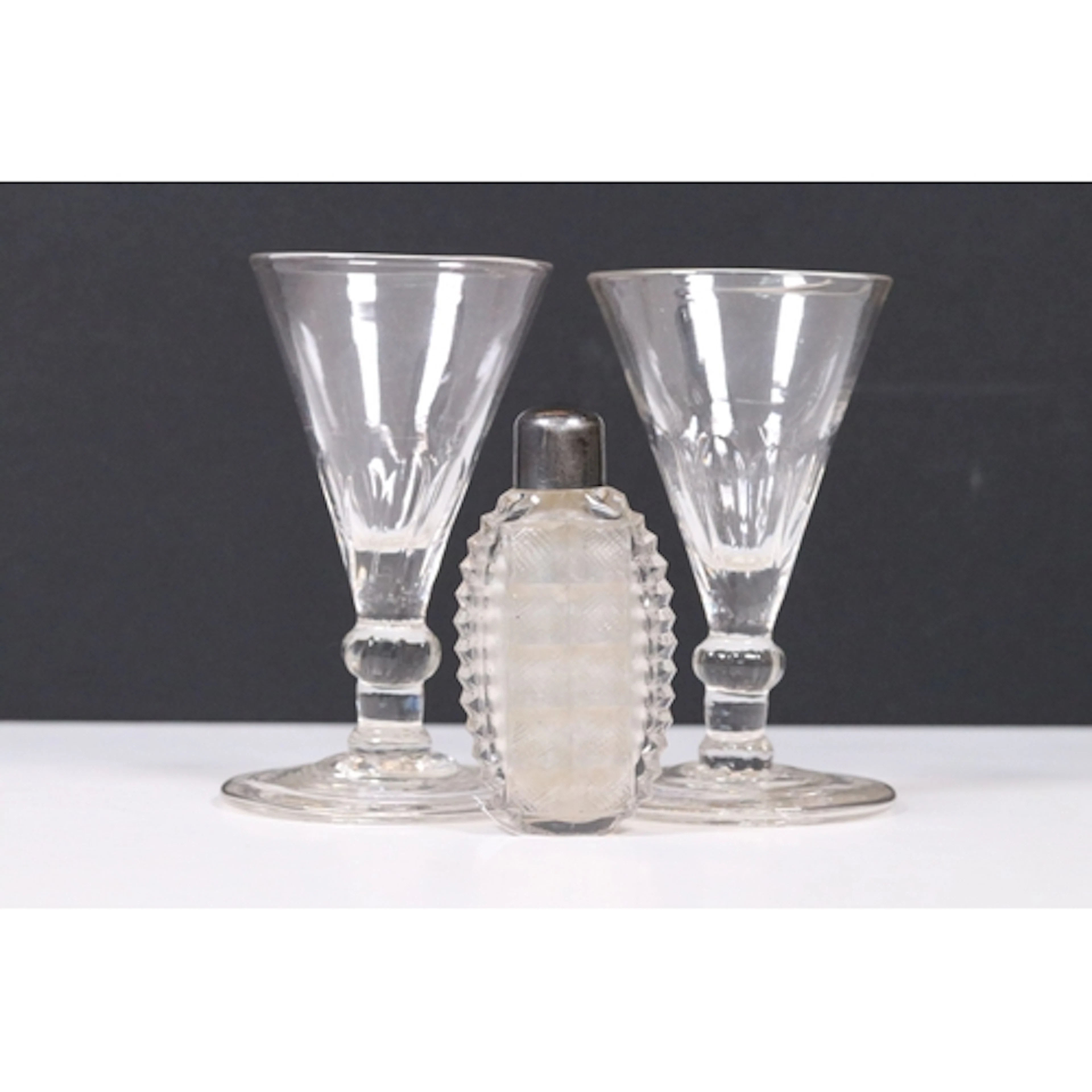Pair of Georgian wine glasses of conical form with footed ba...