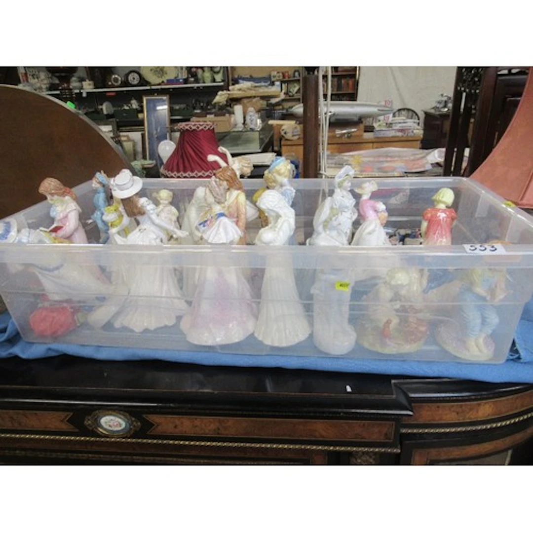 A box of assorted figurines to include Royal Worcester