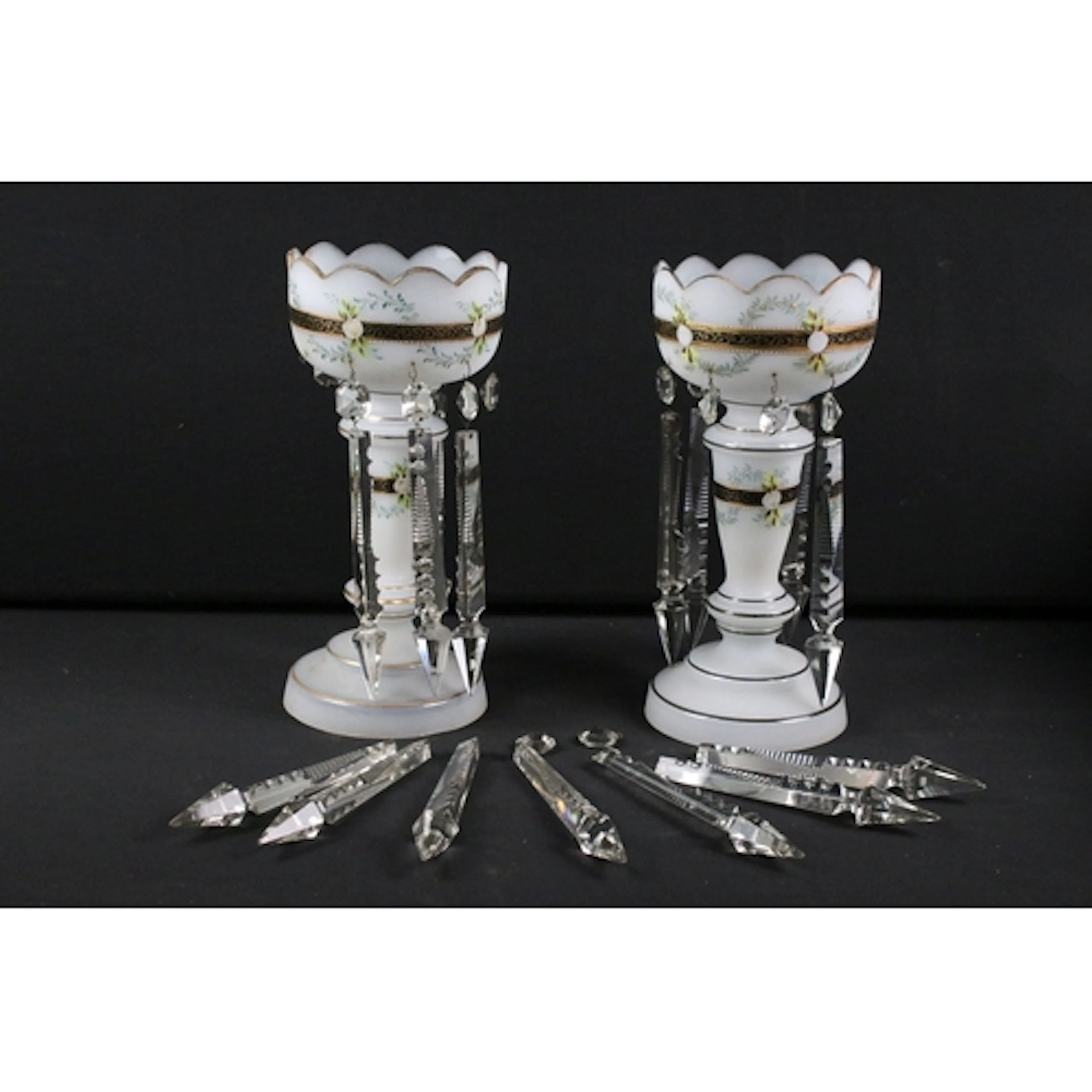 Pair of early 20th century glass lustres, having white groun...
