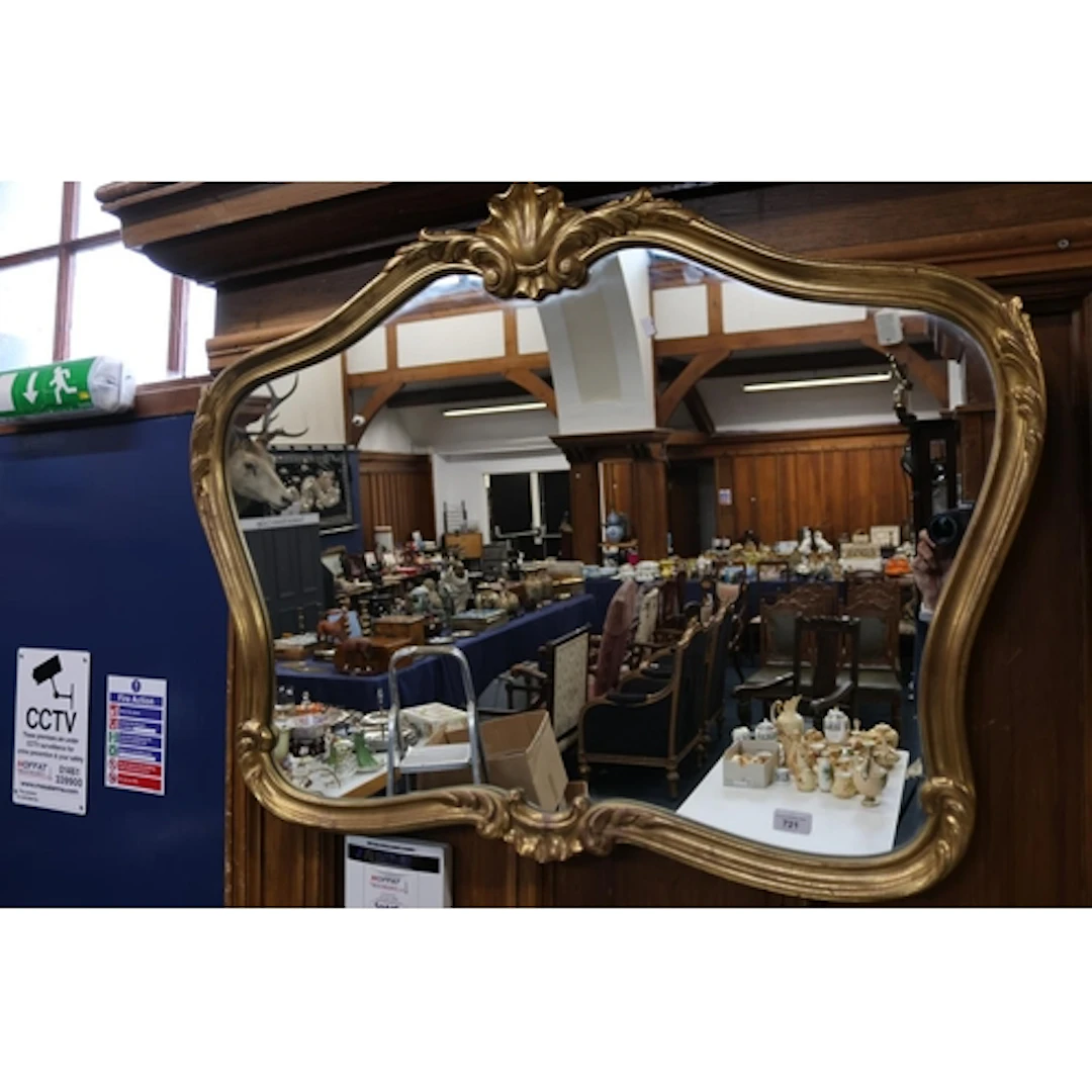 Gilt ornate rococo style wall mirror