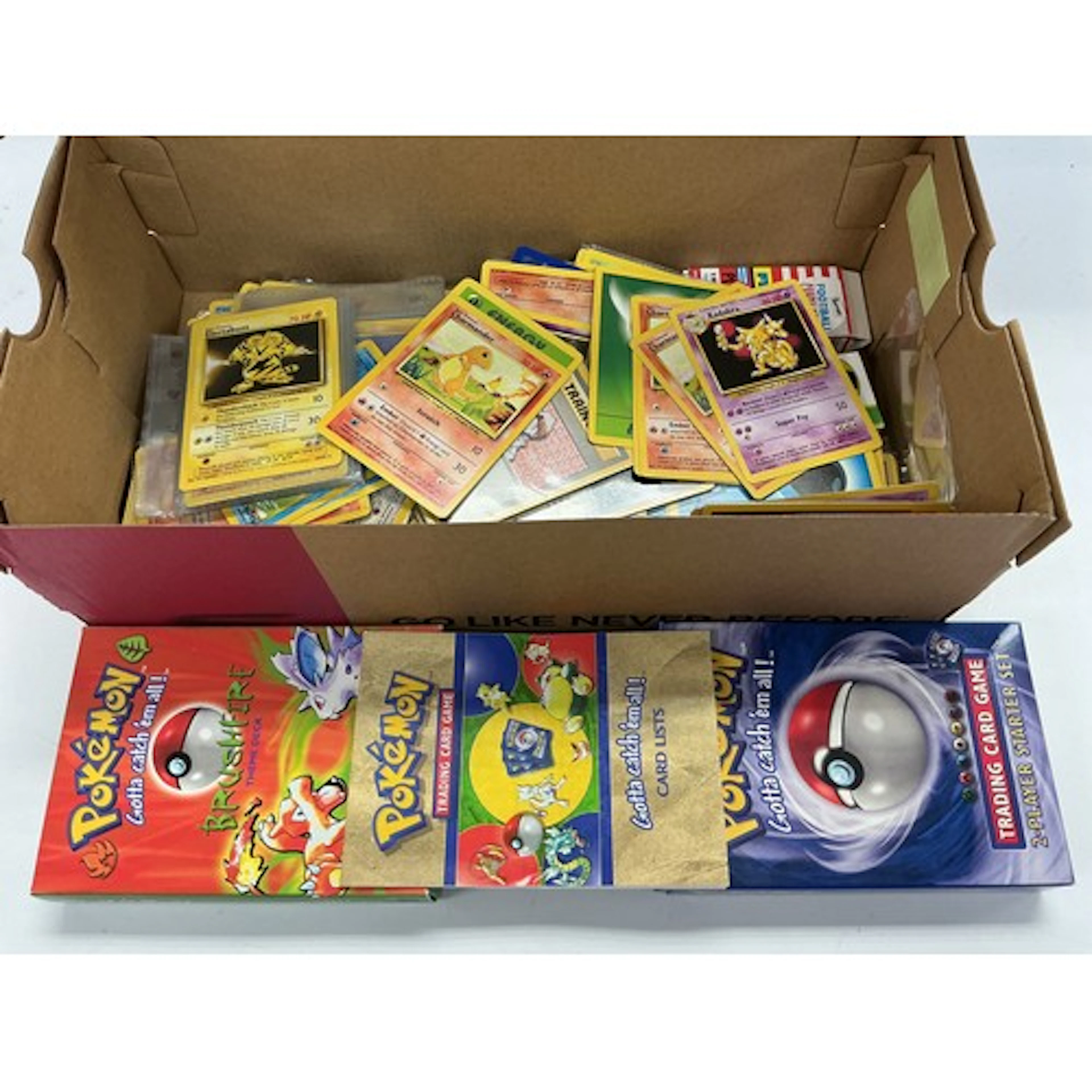 A collection of Pokémon trading cards.