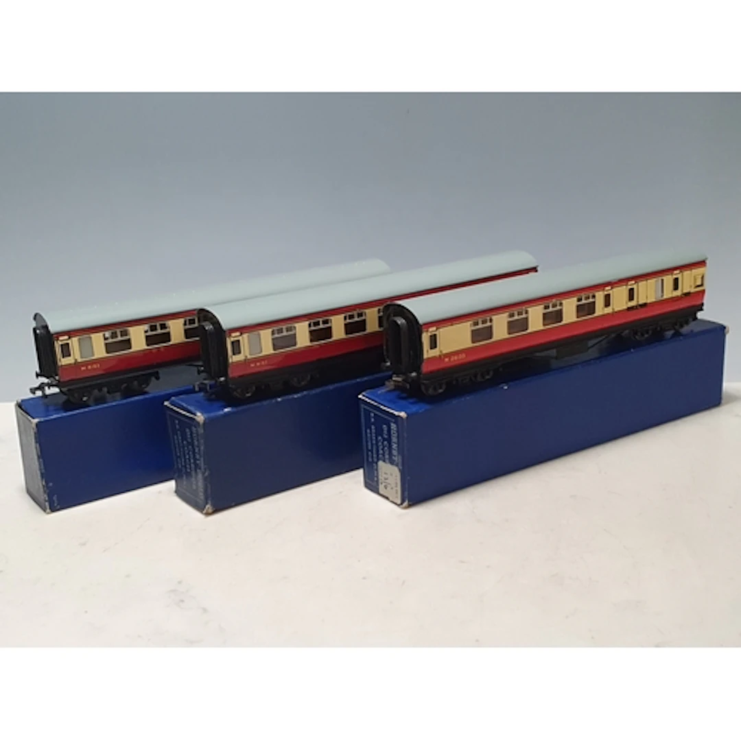 Three boxed Hornby Dublo D12 BR Corridor Coaches with LMS bo...