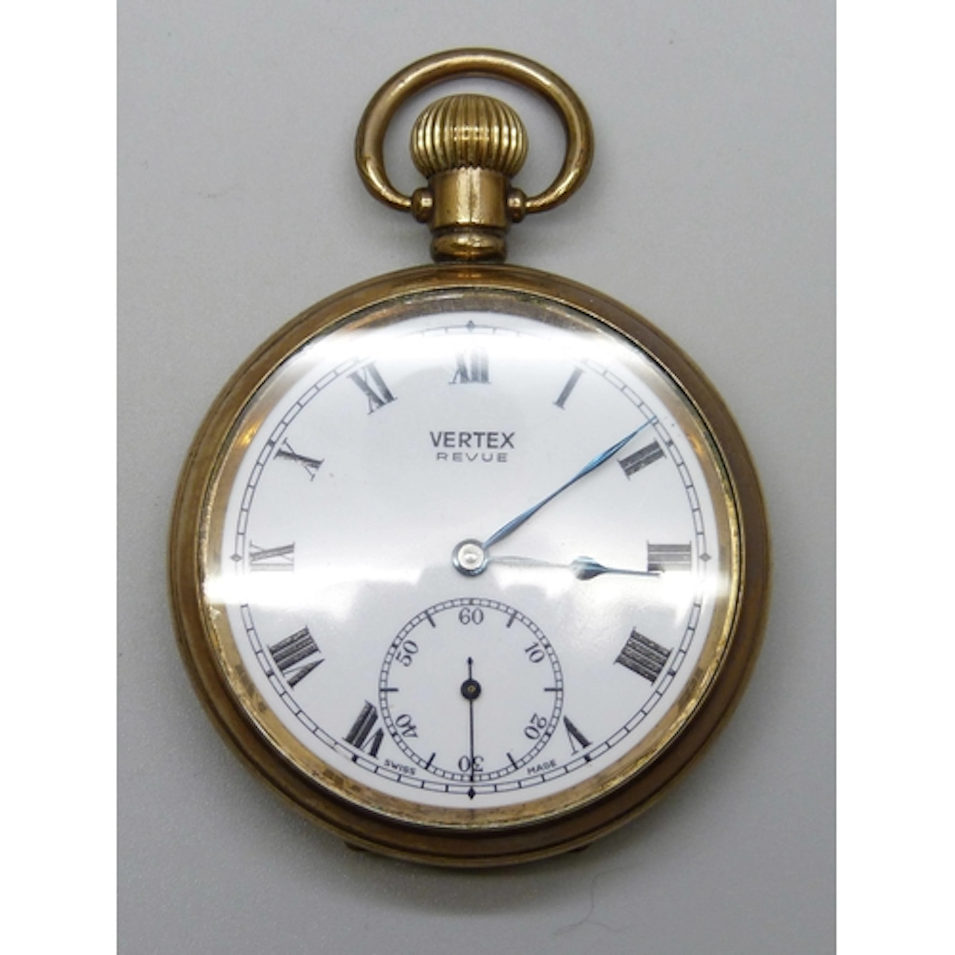 A Vertex Revue gold plated pocket watch