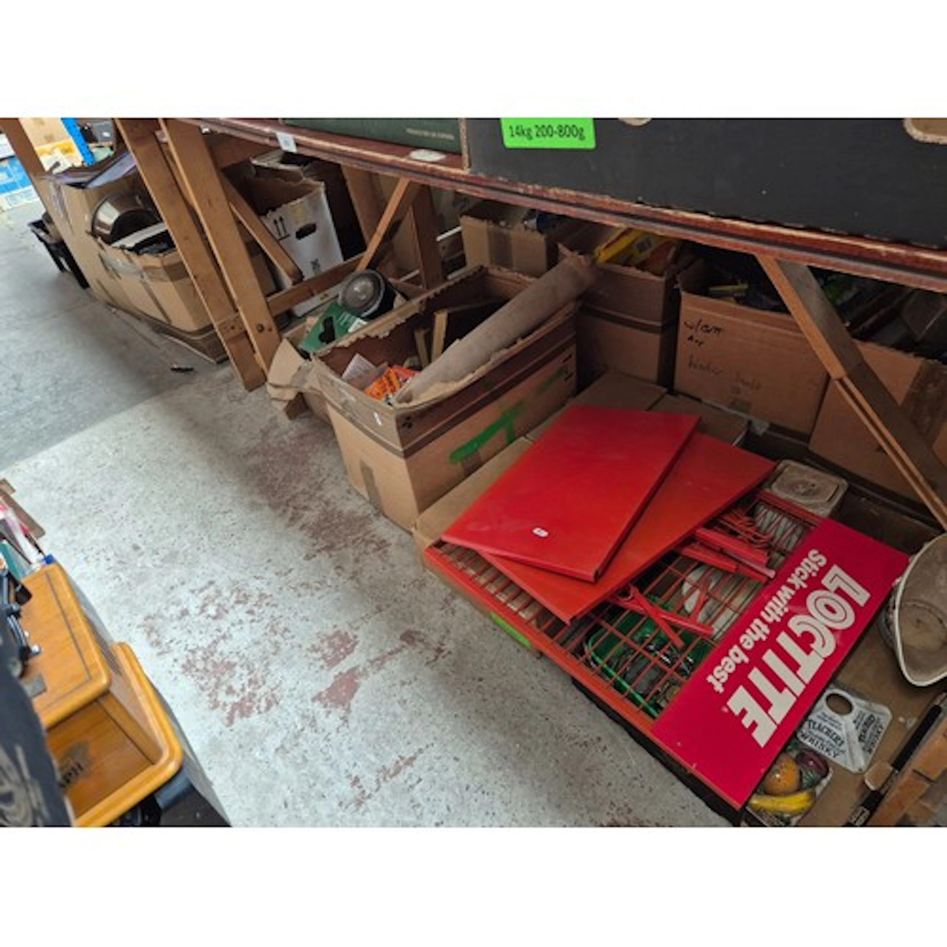8 boxes of mixed items (under 2 tables) including shop sign,...