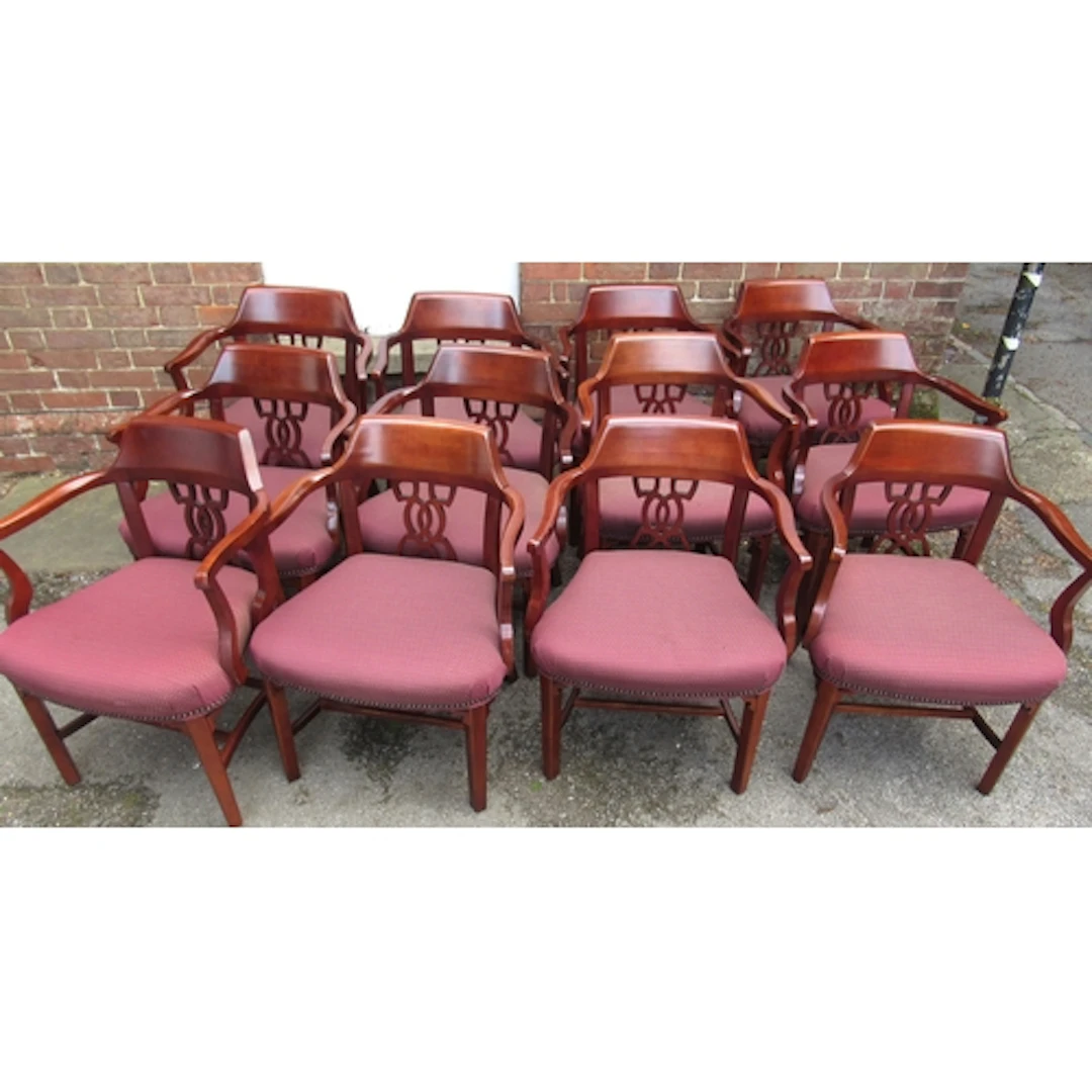 Set of twelve reproduction mahogany open armchairs