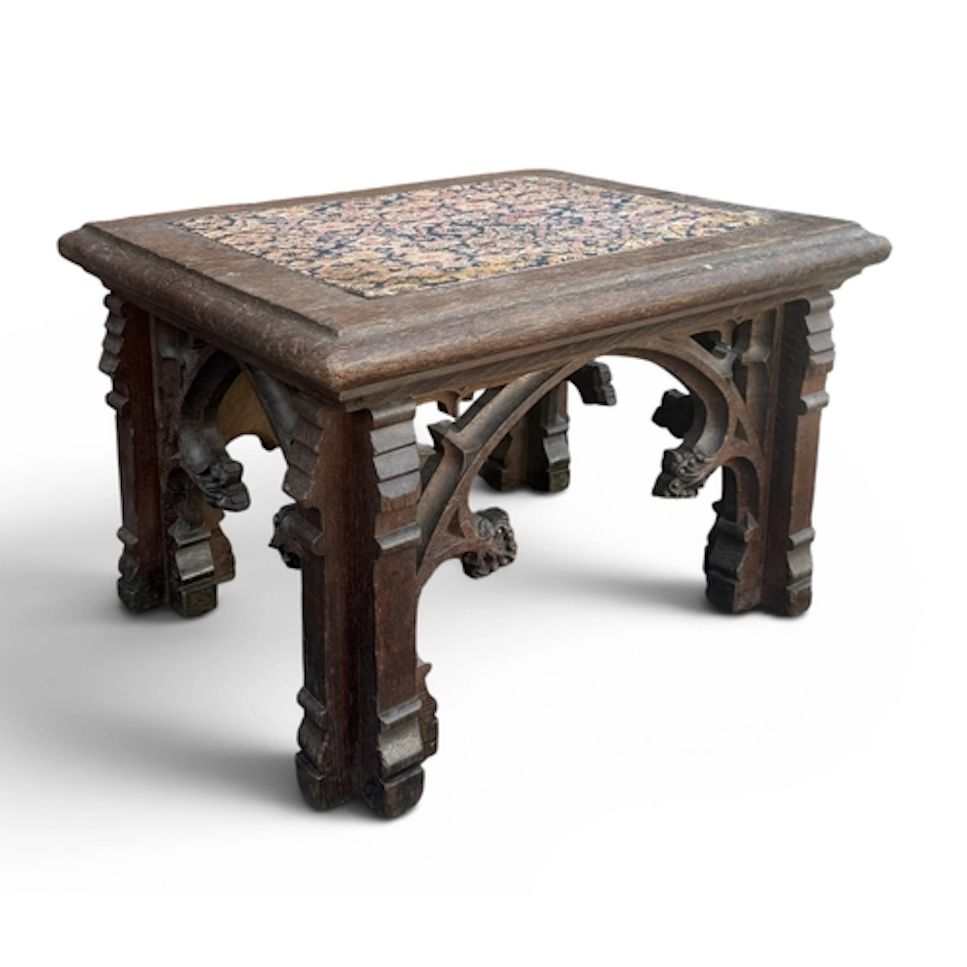 A 19TH CENTURY GOTHIC REVIVAL CARVED OAK TABLE With persian ...