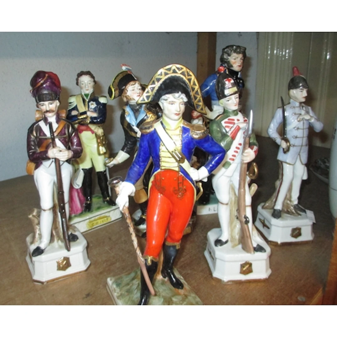 Group of seven porcelain figures, including late Dresden, Na...