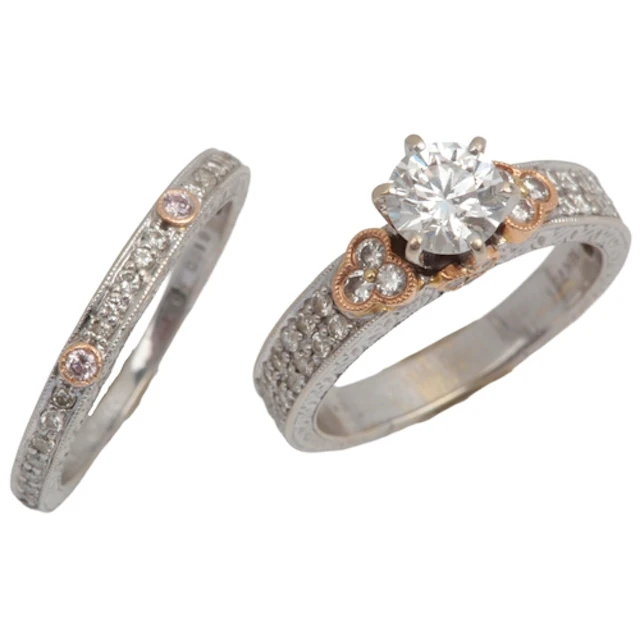 A diamond ring and eternity ring, comprising: a ring, centri...