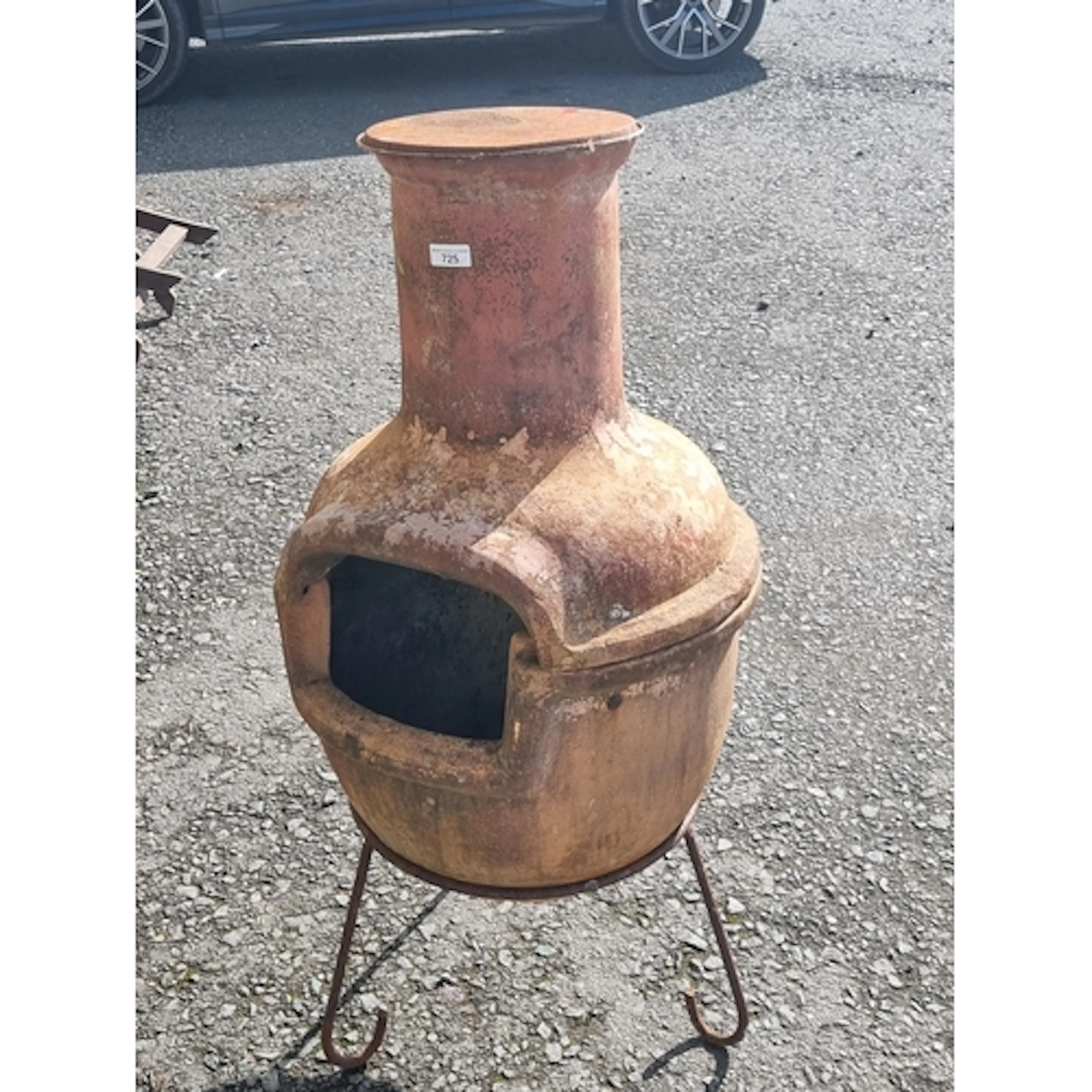 A terracotta Chimenea on stand 3ft 9in H