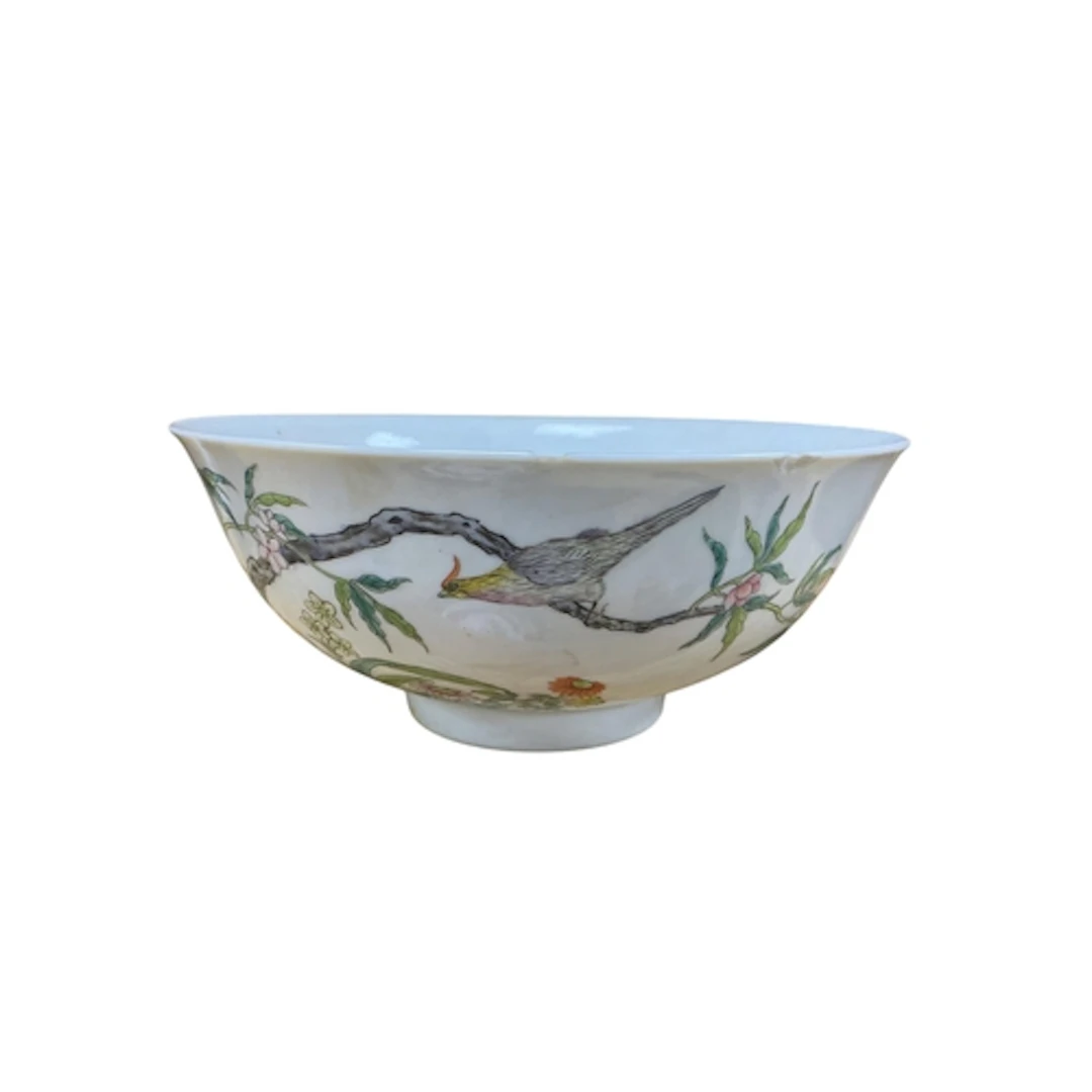 A Chinese famille rose bowl, enamelled with birds and flower...