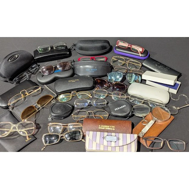 A quantity of glasses and sunglasses,various designers inclu...