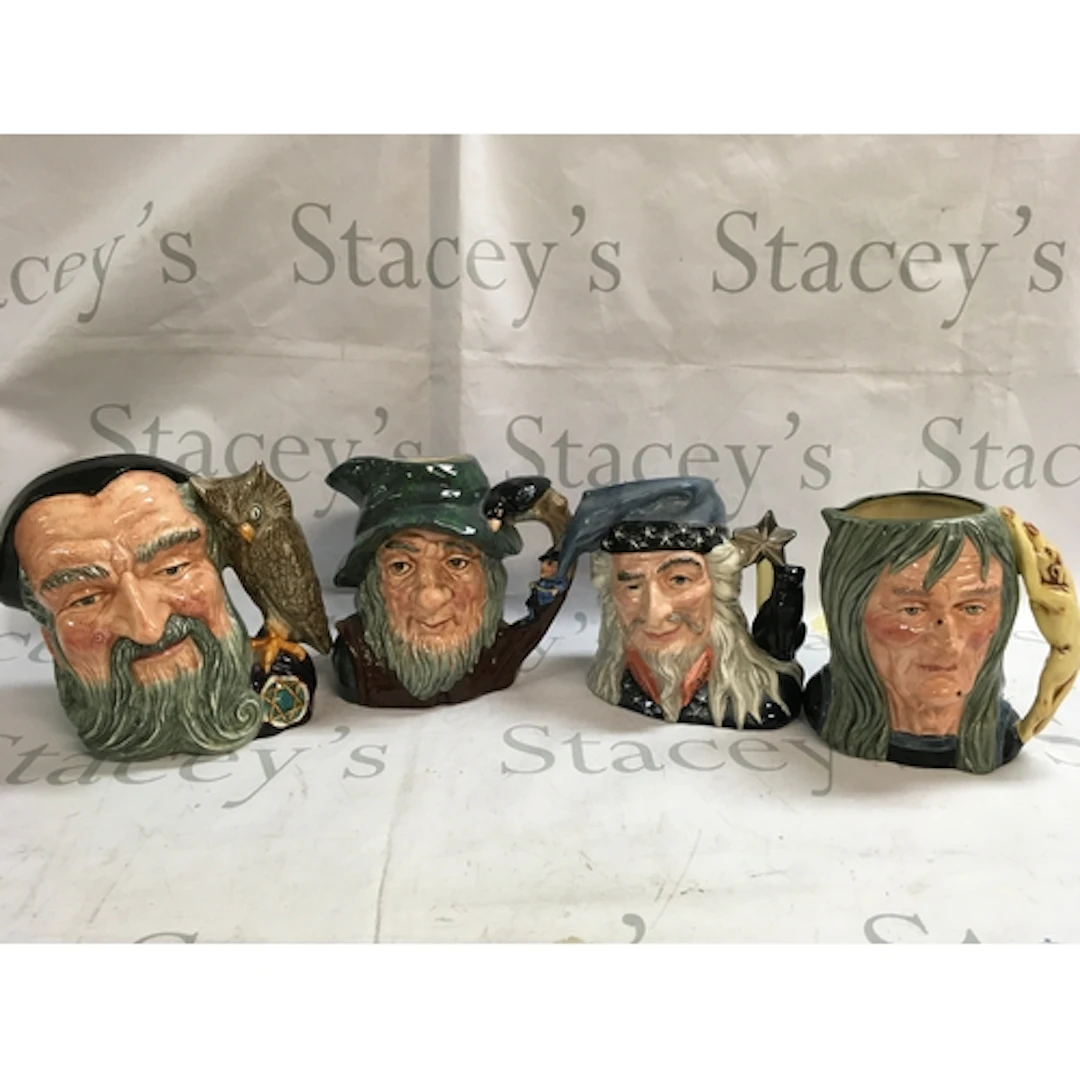 A collection of four Doulton character jugs including Rip Va...