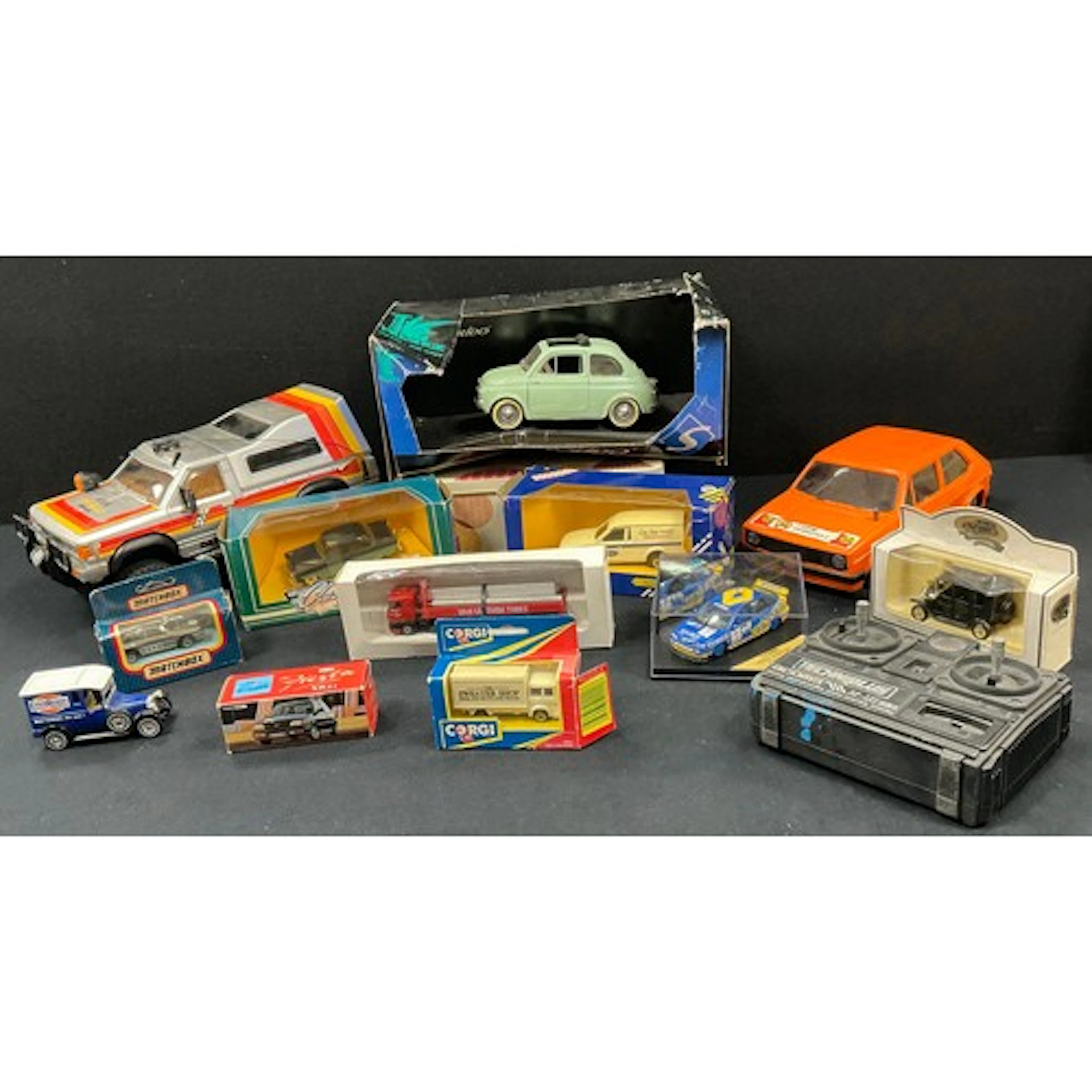 A new bright Datsun radio controlled 4x4; a solid die cast m...