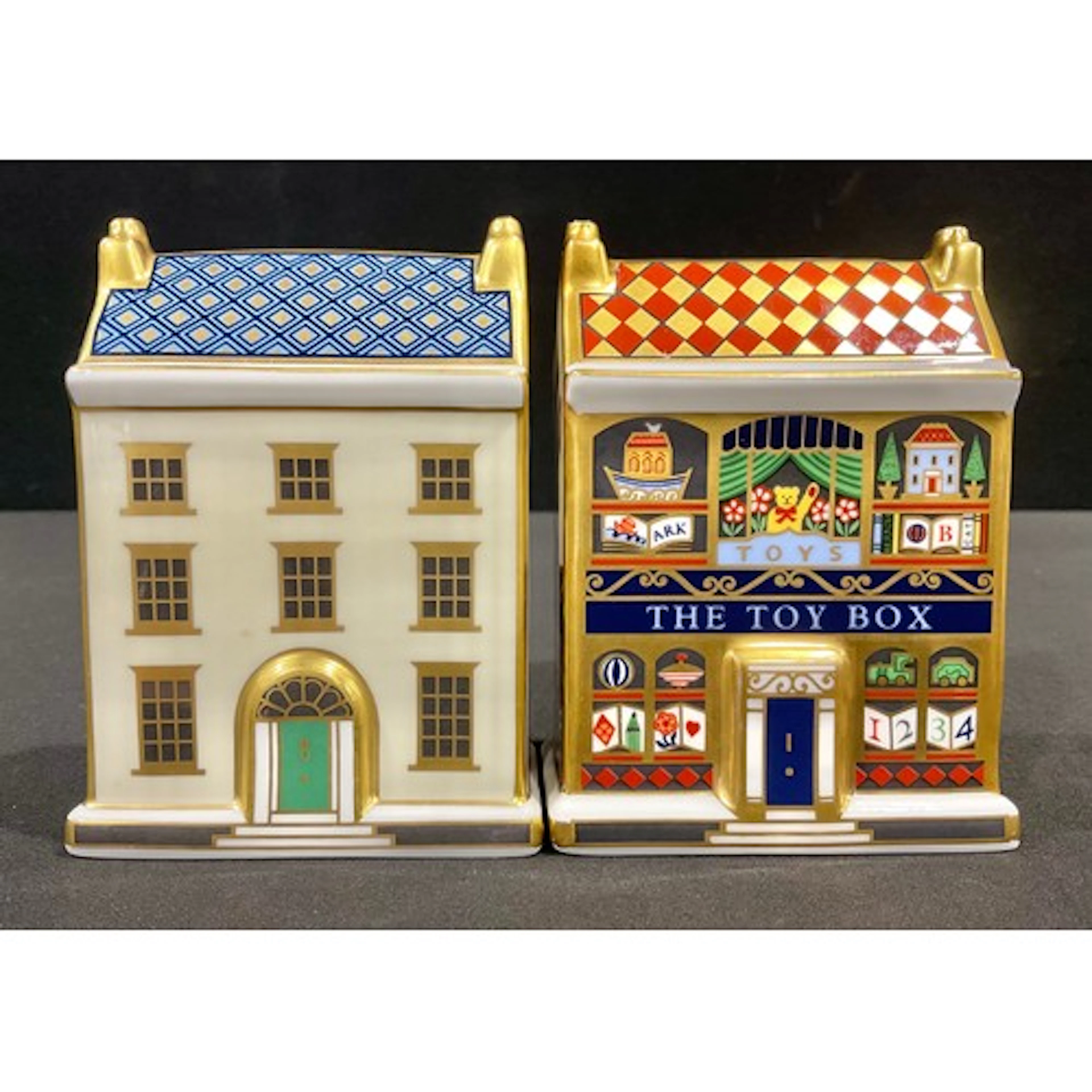 A Royal Crown Derby paperweight, Georgian Town House, red ma...