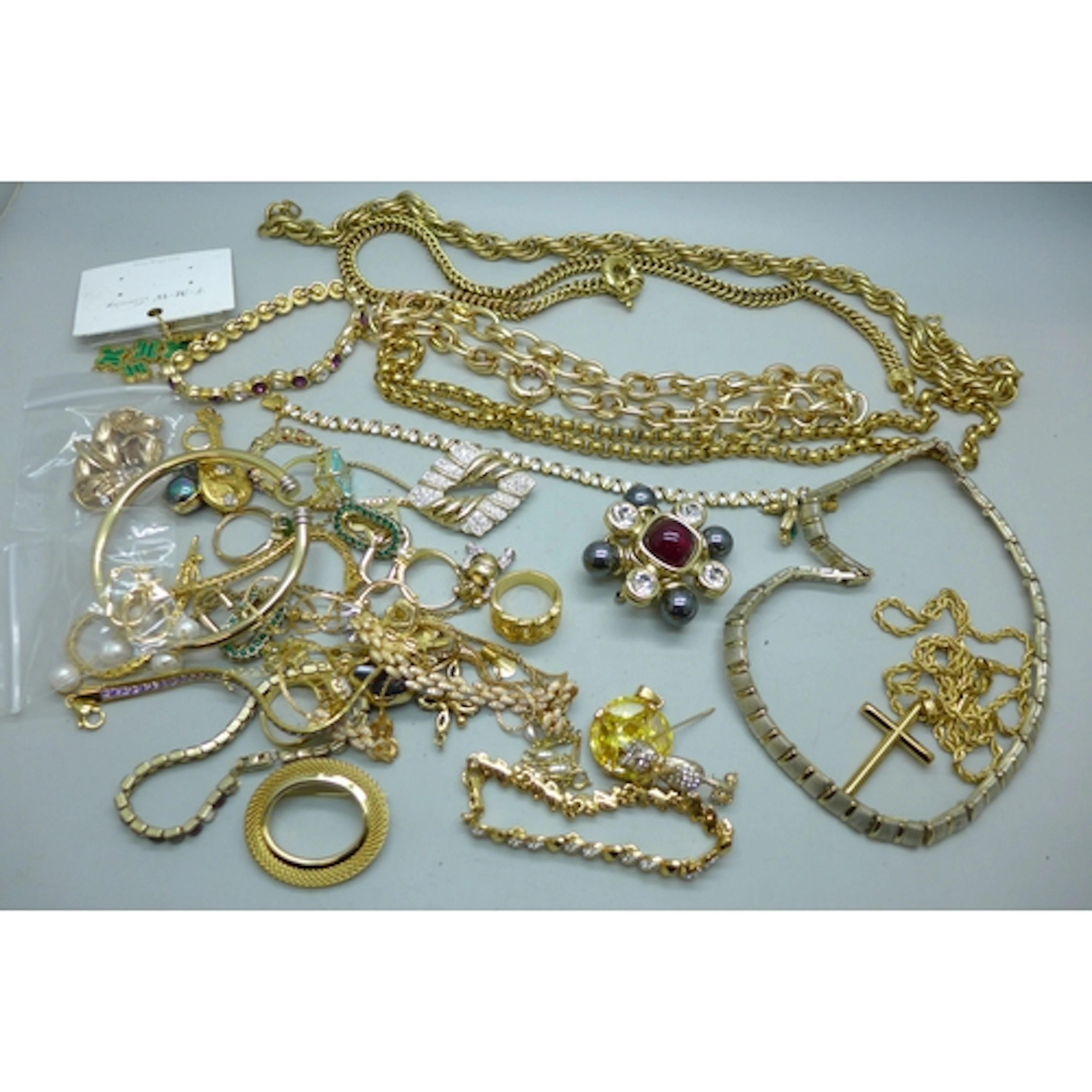 A collection of gold tone costume jewellery