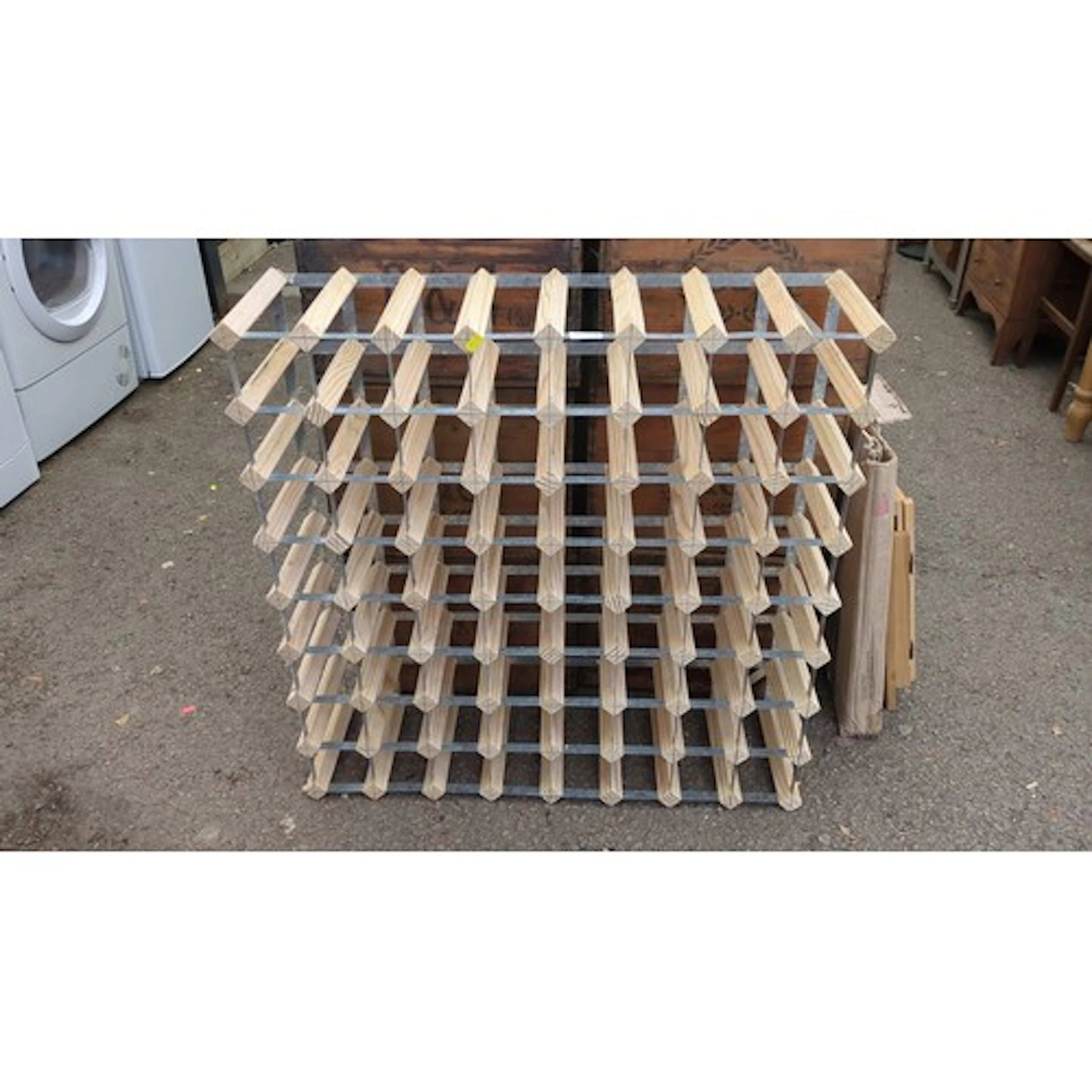 Modular wine rack of pine slats with galvanized steel strap ...