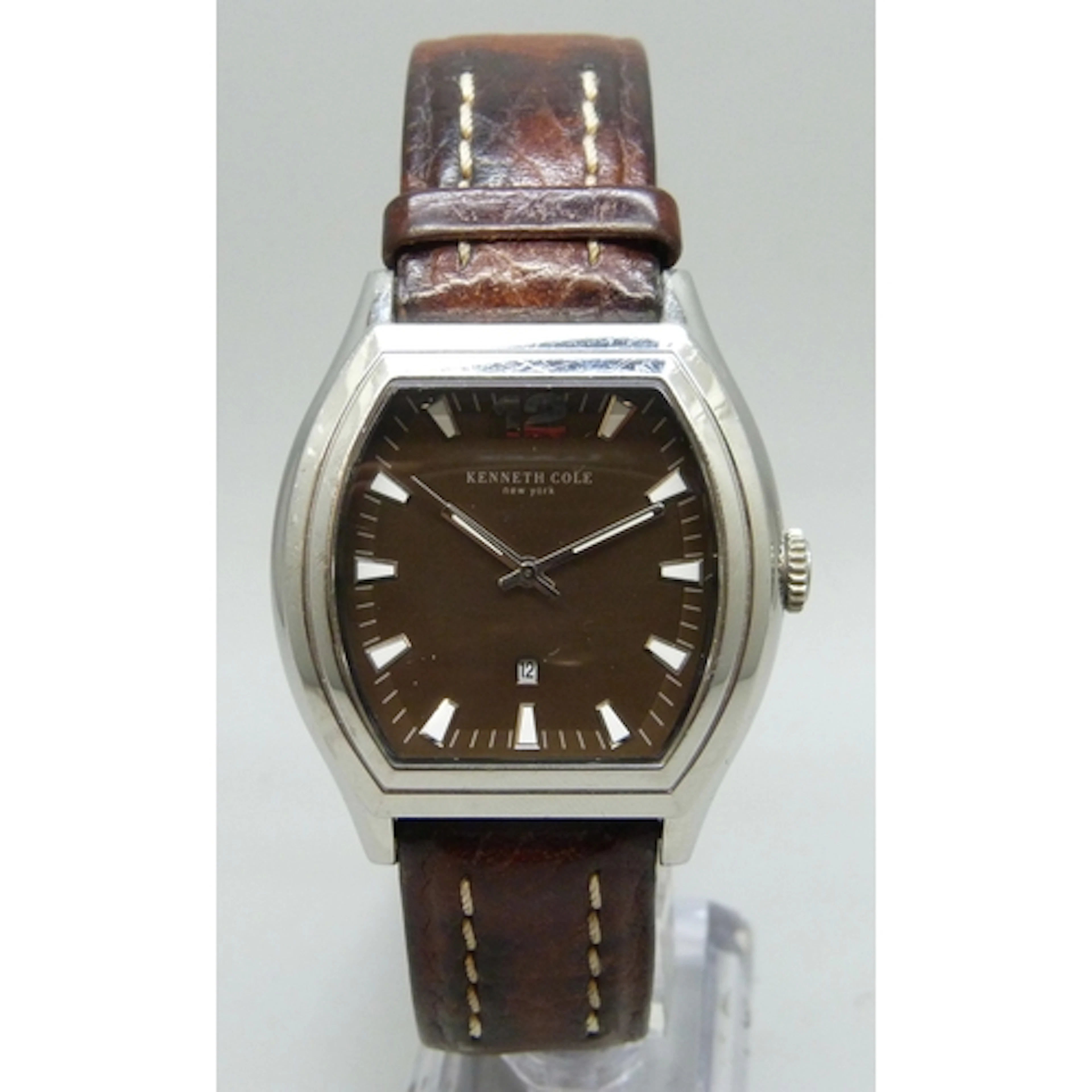 A Kenneth Cole wristwatch with date aperture, 43mm including...