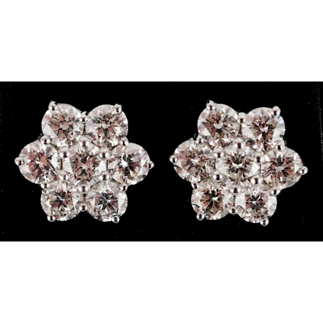 Pair of 18ct white gold round brilliant cut diamond cluster ...
