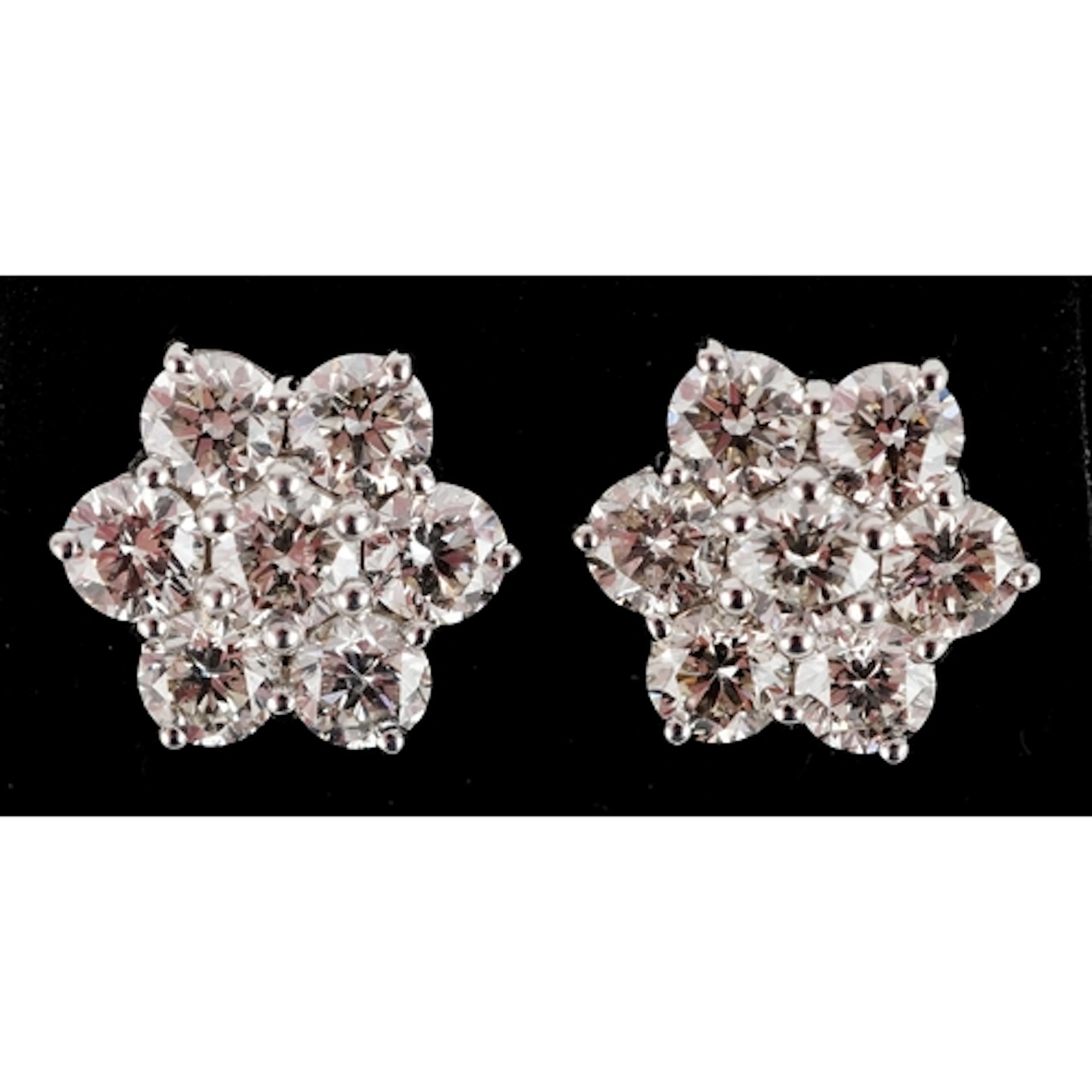 Pair of 18ct white gold round brilliant cut diamond cluster ...