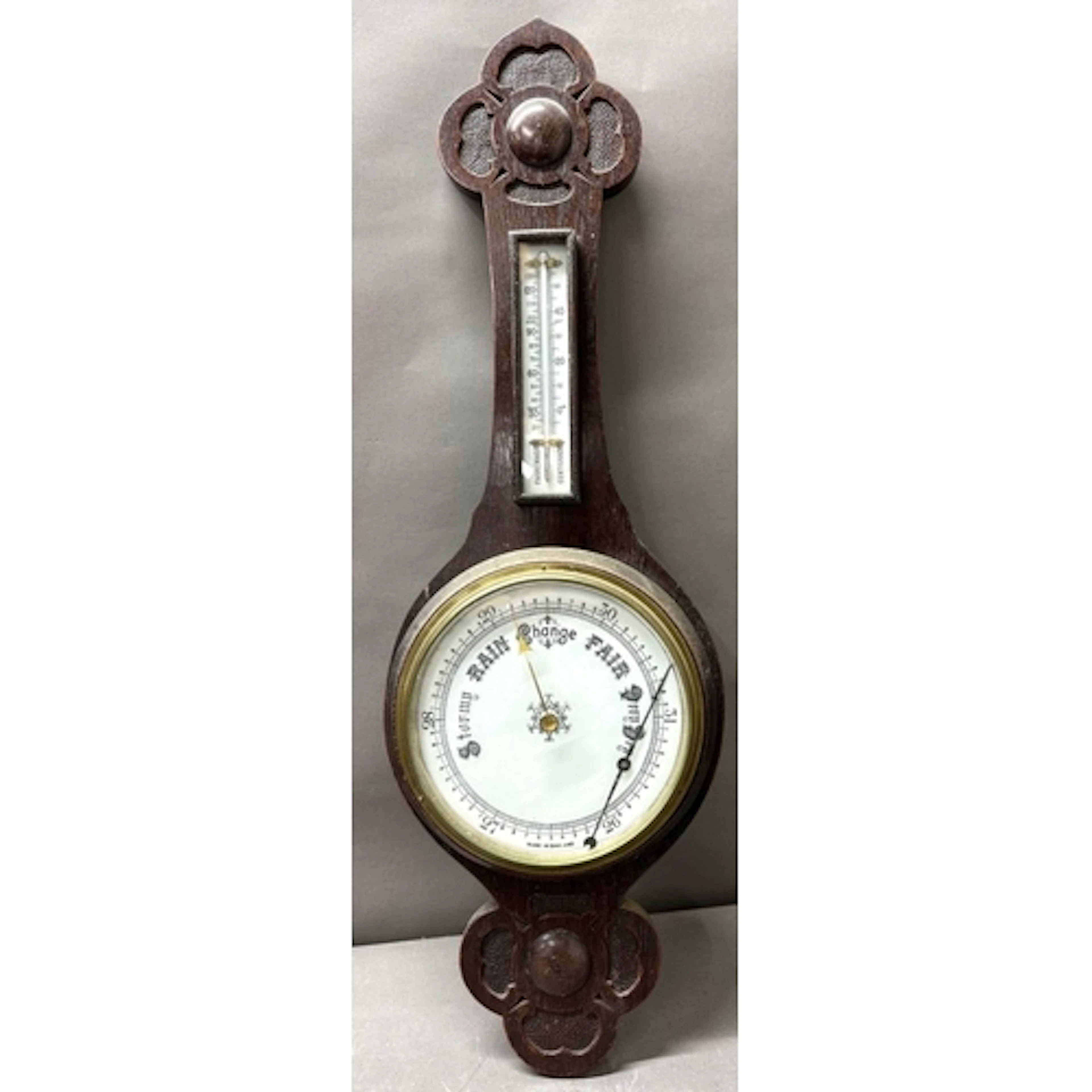 A vintage Banjo barometer with a carved oak case Approx 80cm...