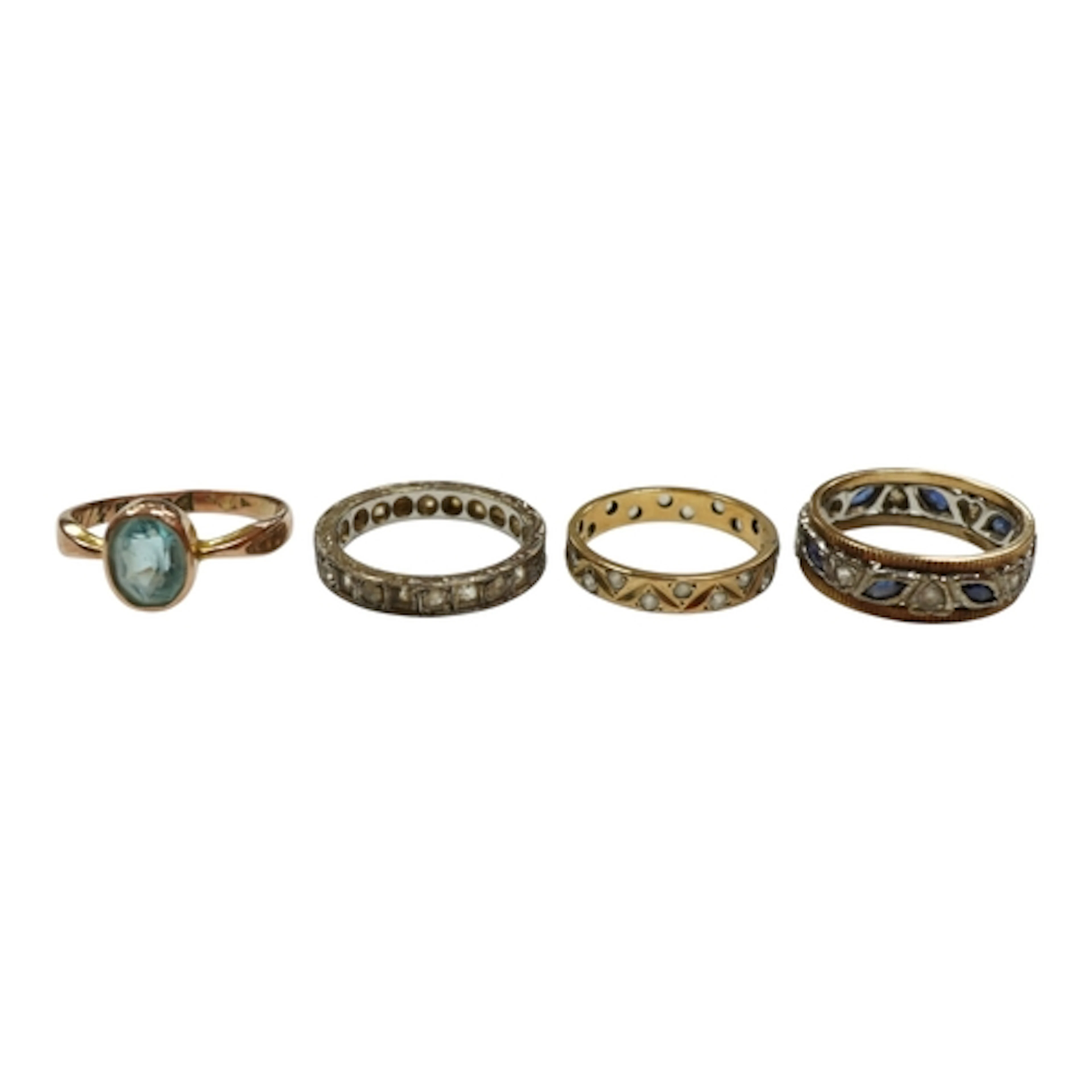 Three assorted 9ct gold and simulated diamond set full etern...