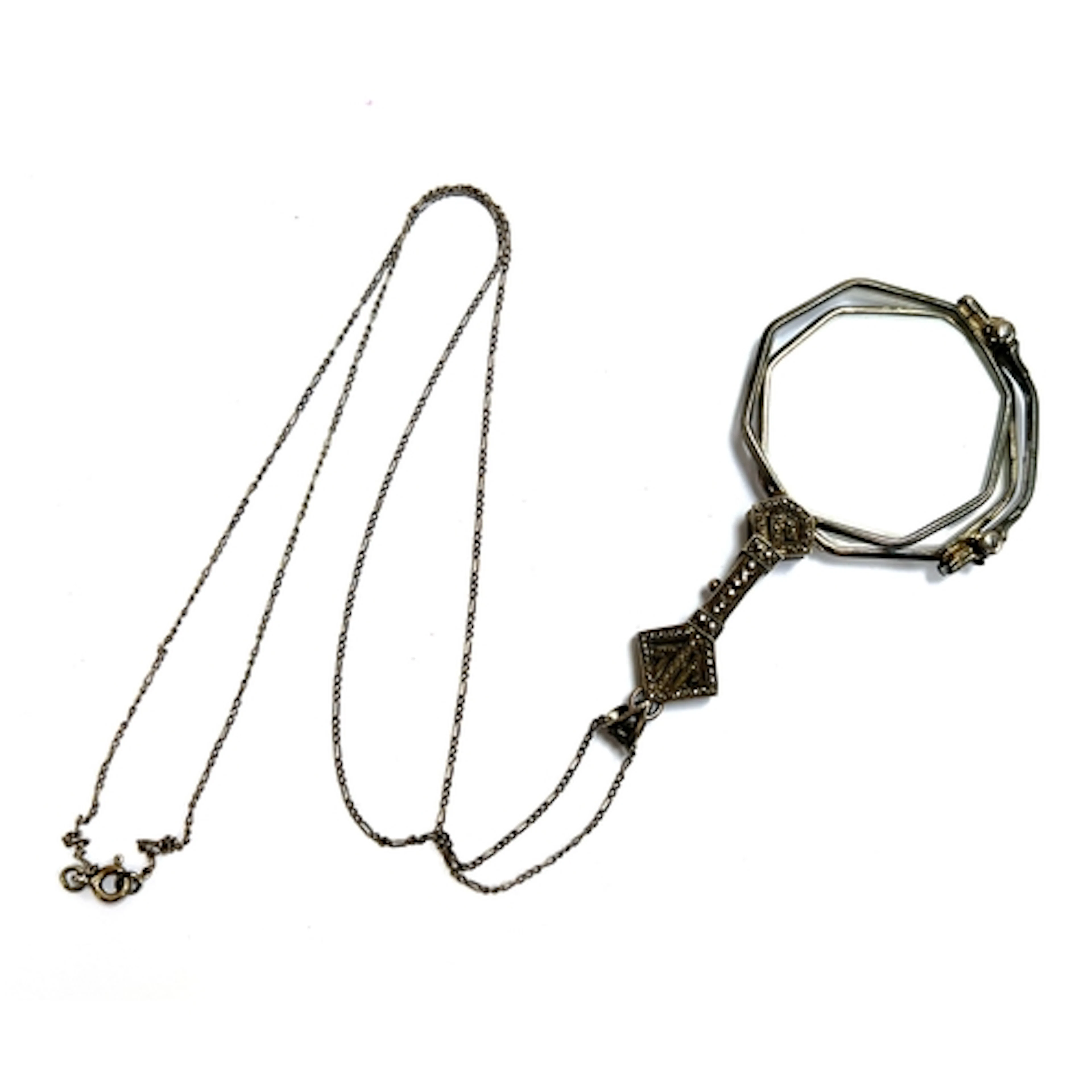 A pair of Art Deco lorgnettes set with marcasite, 7.5cmL