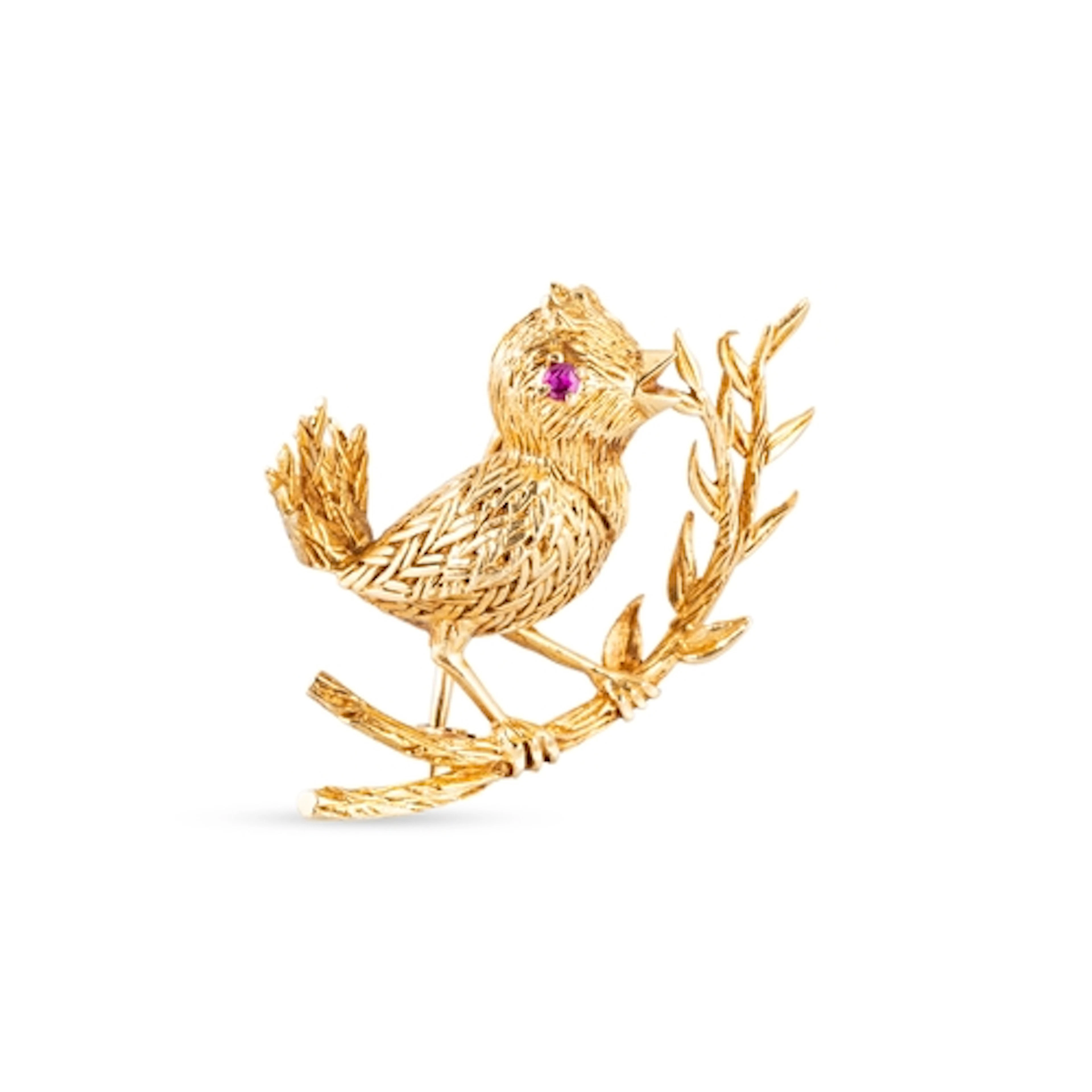 A VINTAGE "BOUCHERON NOVELTY BROOCH" in the form of a bird o...